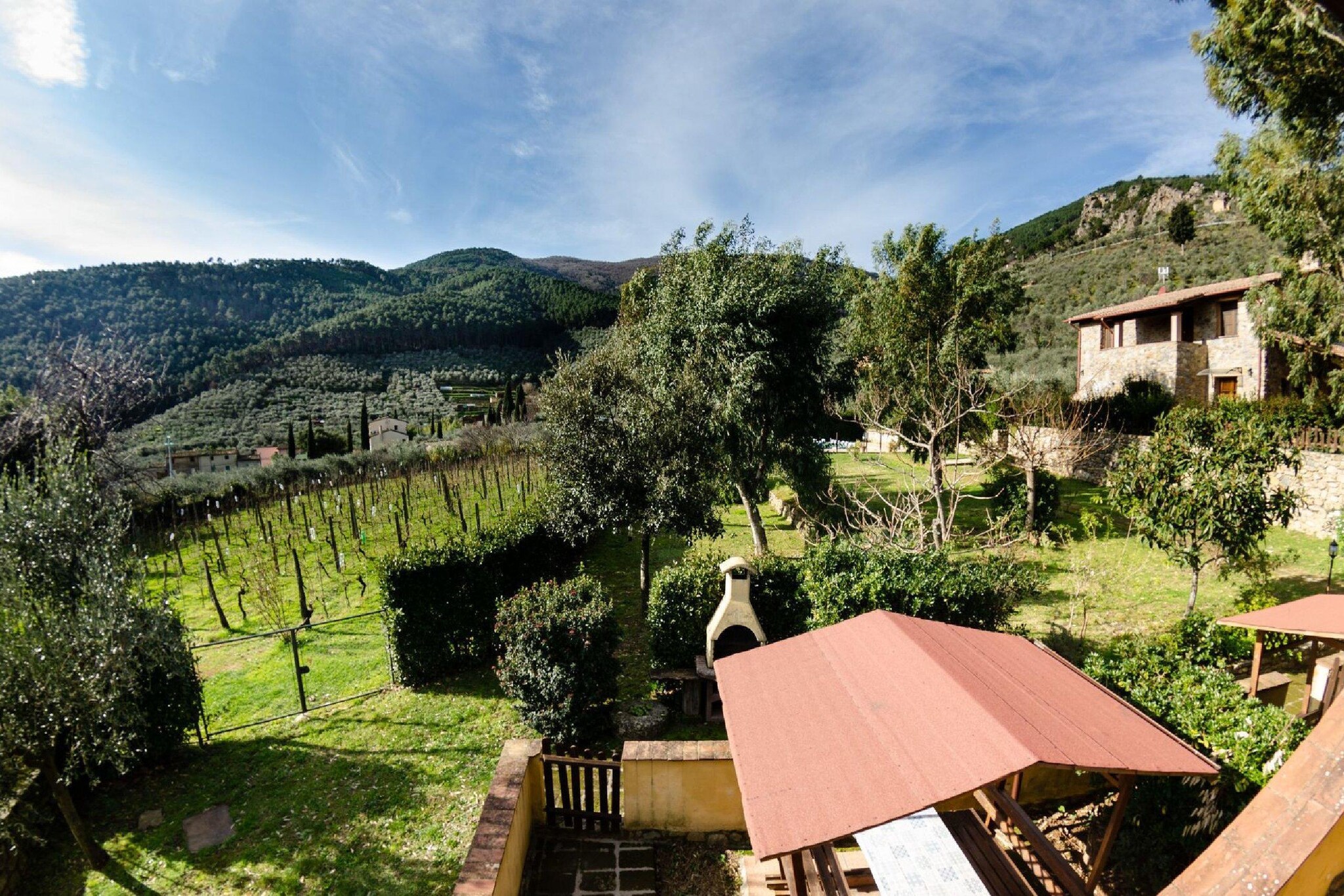 Situated in the heart of Buti, this spacious two-storey property offers a comfortable and convenient base for exploring Tuscany. The ground floor features an open kitchen, a living/dining room, a double bedroom, a bunk bedroom, a bathroom, and a veranda. Upstairs, you'll find a second open kitchen, another living/dining room, a double bedroom, a bunk bedroom, and a second bathroom.
The property boasts a shared garden with outdoor furniture, a barbecue area, parking facilities, and a swimming pool (13 x 6 m), open from May 1st to September 1st. It's just 100 meters from local restaurants, making dining out easy and enjoyable. The property is also pet-friendly, ensuring that your furry companions can join you on your Tuscan getaway.
Buti is a charming village nestled on the eastern slopes of Monte Pisano, offering a blend of natural beauty and rich history. Visit the nearby Medici Villa, explore the ancient Castel Tonini, or hike the scenic trails of the Monti Pisani. For a taste of local culture, try the traditional trippa alla butese at one of the local eateries. With its proximity to Pisa, Lucca, and the Tyrrhenian coast, Buti serves as an ideal starting point for discovering the treasures of Tuscany.