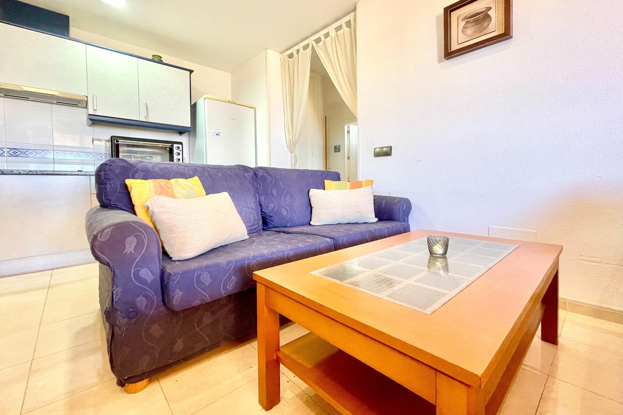 Welcome to your ideal retreat for two in the beautiful La EnvÃa! This charming 8th-floor apartment offers everything you need for a relaxing getaway. Accessible via a convenient lift from the ground floor, the apartment features a cozy living room equipped with a double sofa bed, a dining area, a TV, and a comfortable seating area—perfect for unwinding after a day of exploration. Step outside onto your private terrace, where you can soak up the sun on deck chairs while enjoying stunning views. For added relaxation, head up to the 9th floor, where you’ll find a shared relaxation area featuring a hot tub and solarium—ideal for unwinding in style. 
The open kitchen is well-equipped with a hob and other essential appliances, making it easy to prepare delicious meals during your stay. The inviting bedroom boasts a double bed, ensuring a peaceful night’s sleep. Enjoy year-round comfort with air conditioning and an air-to-air heat pump. Convenient parking is available in the garage, making your stay even more hassle-free.  
 Whether you’re looking to explore the nearby beaches, indulge in local cuisine, or simply relax in a beautiful setting, this apartment in La EnvÃa is the perfect home base for your getaway. Book your stay today and experience the charm of this lovely destination!