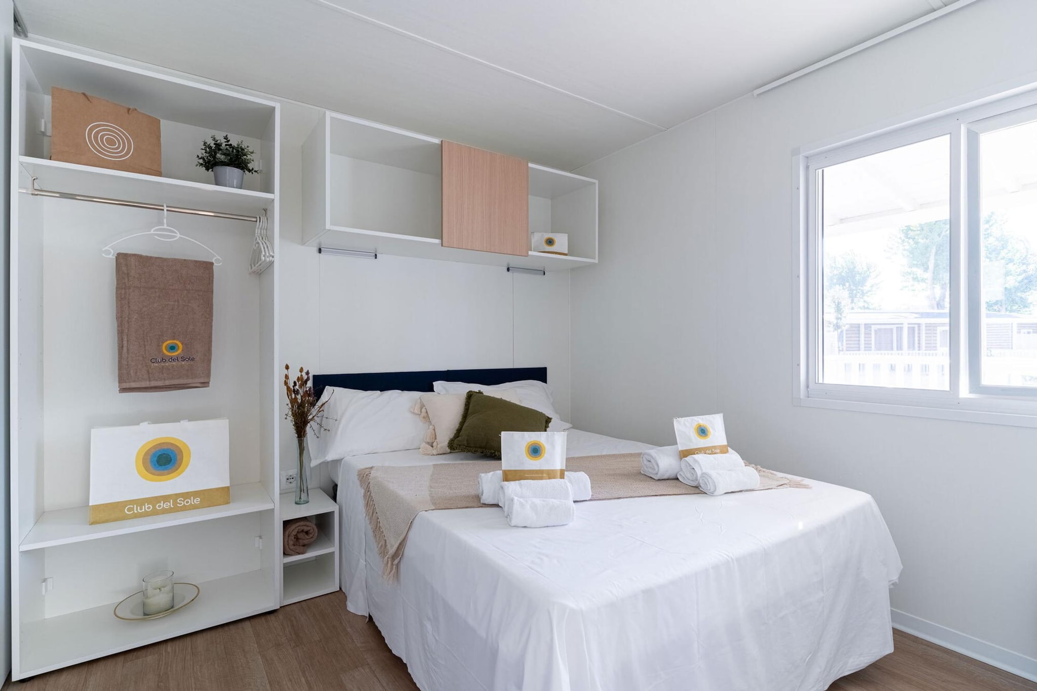 The perfect family holiday: located directly on the expansive beach of Rimini, the Rimini Family Resort offers everything for a wonderful break with your loved ones.
Every family member can plan their days as they wish, because the park offers variety for young and old.
You will live in a modern lodge that is equipped with everything you need for a pleasant stay.
Each residential unit in the green has its own spacious veranda where you can end the day with a delicious glass of wine.
This is what the resort offers:
- Reception
- Restaurant, pizzeria, bar
- Supermarket, bazaar, newsstand
- Beach service on over 35,000 square meters of beach (service for a fee, subject to availability)
- Dog beach, dog pool and exercise area
- Water park (open from around mid-May to mid-September)
- Bicycle rental (also e-bikes)
- Animation, mini club
- Laundry
- Various sports facilities, such as fitness, table tennis and much more
- Playground
- 1 parking space per lodge
You will receive a wristband with a cashless payment system on site - so you can easily shop for your purchases and souvenirs at any time.
Various excursions and guided tours are also offered on site. The friendly team will help you with advice.
It is the ideal destination to discover Rimini and its nightlife.
But excursions into the surrounding area are also worth a trip: for example, go to San Marino, the tiny state whose historic center will inspire you.