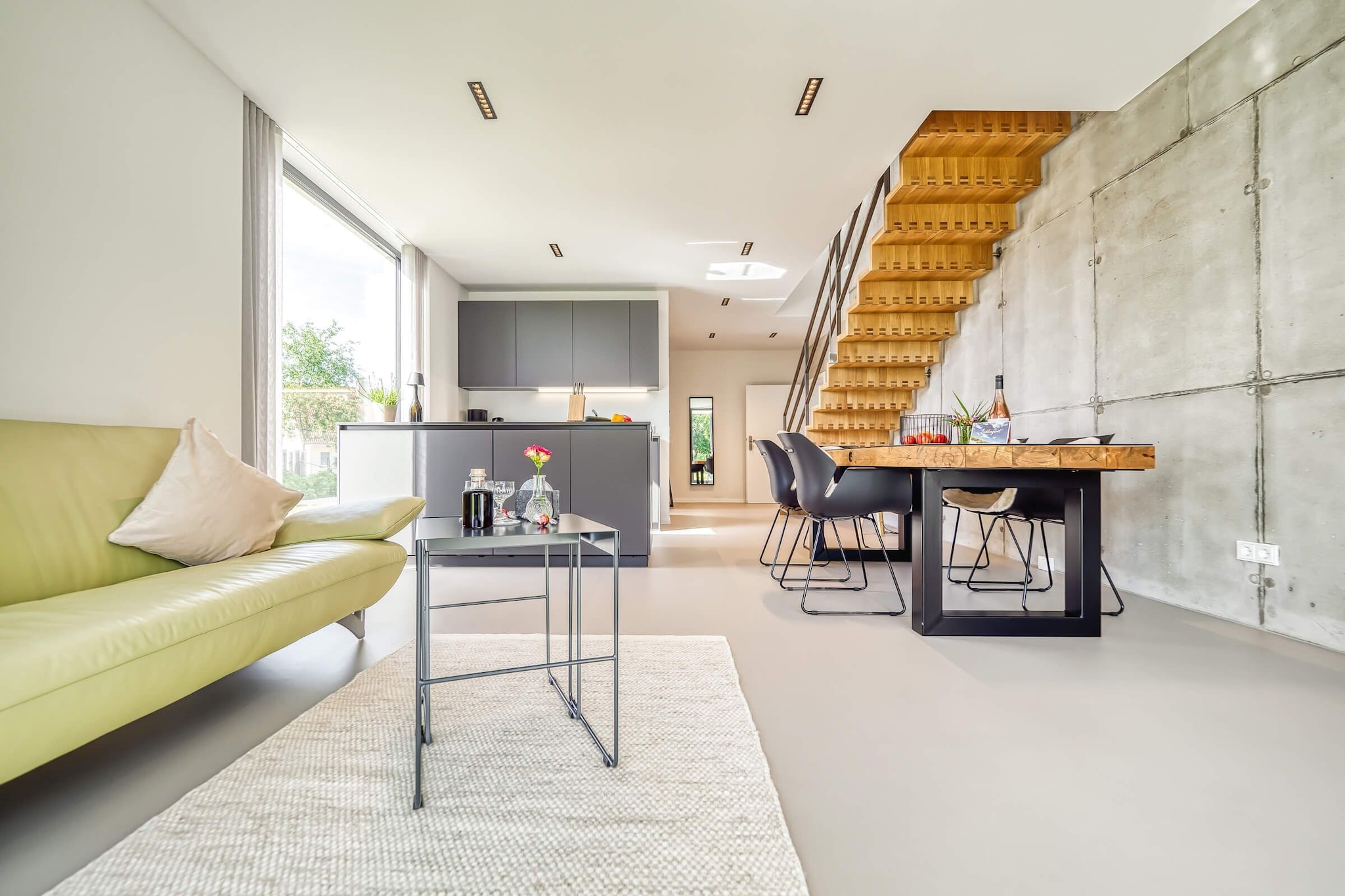 Ground floor: (open kitchen(electric kettle, toaster, cooker(4 ring stoves, ceramic), hood, coffee machine, oven, microwave, dishwasher, fridge(+ freezer)), Living/diningroom(TV, dining table(4 persons), fireplace, CD player, stereo unit), toilet, storage)\n\nOn the 1st floor: (bedroom(double bed, TV), bedroom(double bed), bathroom(bath tub, shower, washbasin, toilet, bidet, hairdryer))\n\nLawn, washing machine, heating(floor heating), terrace, garden, garden furniture, BBQ(electric), parking, parking, parasol, high chair, ironing board, iron, baby crib(free), Towels/Sheets (Incl.)