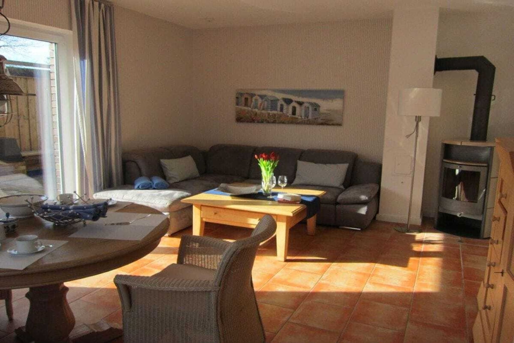 Ground floor: (hallway(Mirror, Wardrobe Coatrack, heating), open kitchen(Egg Cooker, Mixer, TV, dining table, stove, hob, electric kettle, toaster, cooker, coffee machine, oven, dishwasher, fridge, heating), bedroom(double bed, TV, heating), bedroom(double bed, heating), bathroom(Mirror, toilet, shower, washbasin, heating), storage(Vacuum Cleaner, drying cabinet))\n\nHot Water, Internet Access DSL, Internet Access ISDN, Vacuum Cleaner, carport, Internet access, Internet access, washing machine, heating, terrace(Sun Umbrella, Beach, garden furniture, sun loungers, awning), iron, drying cabinet