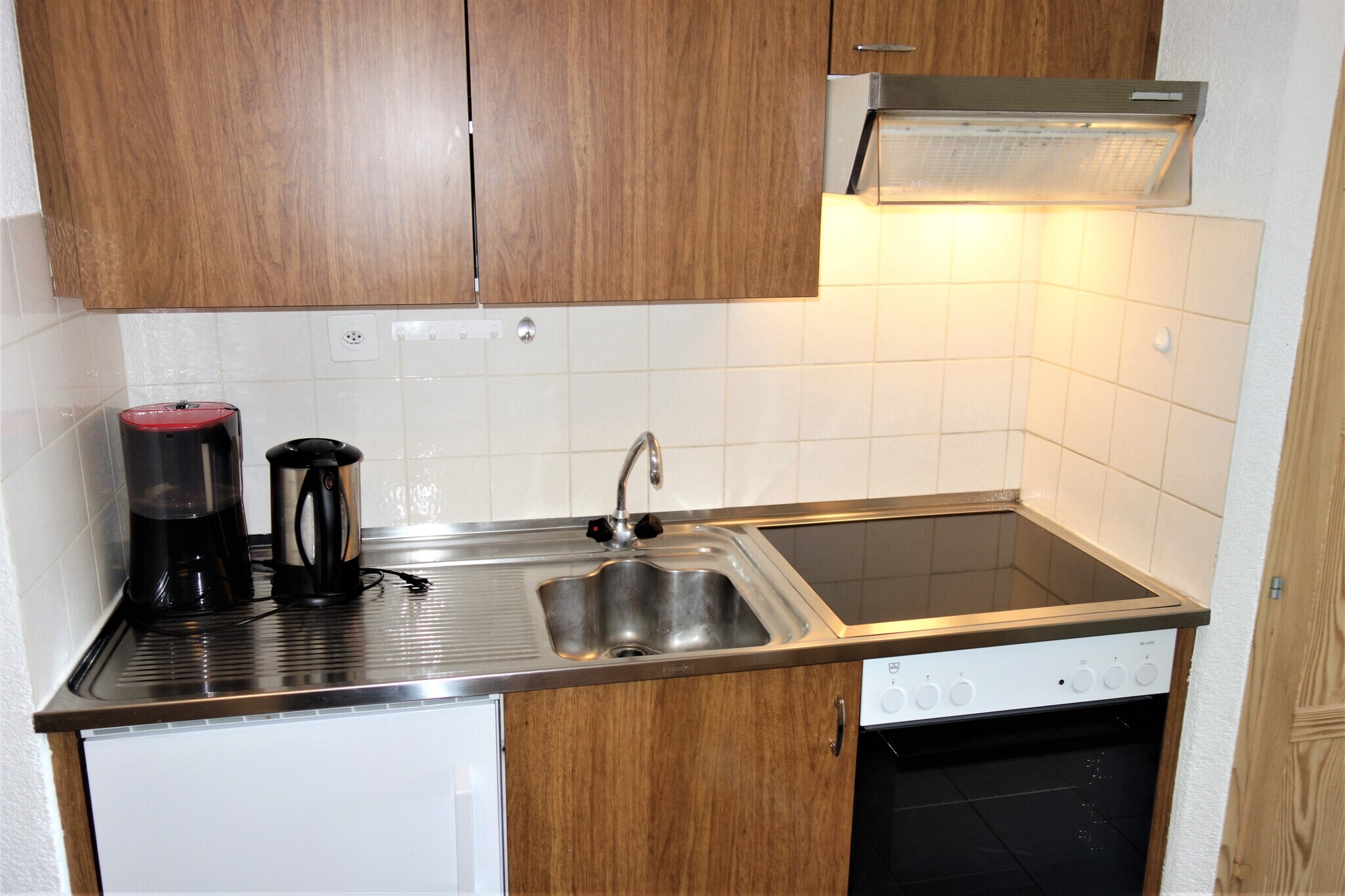 On the 1st floor: (open kitchen(coffee machine(filter), oven, fridge, freezer, dishes and cutlery(Bowls, chopsticks, plates, cups, etc.), Cooking basics), Living/bed room(double sofa bed(140 x 200 cm), double sofa bed(140 x 200 cm), TV(satellite), dining table, radio, heating(central)), bathroom(shower, washbasin, toilet), Internet access, balcony)\n\nski storage, washing machine, garden furniture, parking, swimming pool(shared with other guests), lift, Laundry Package incl.