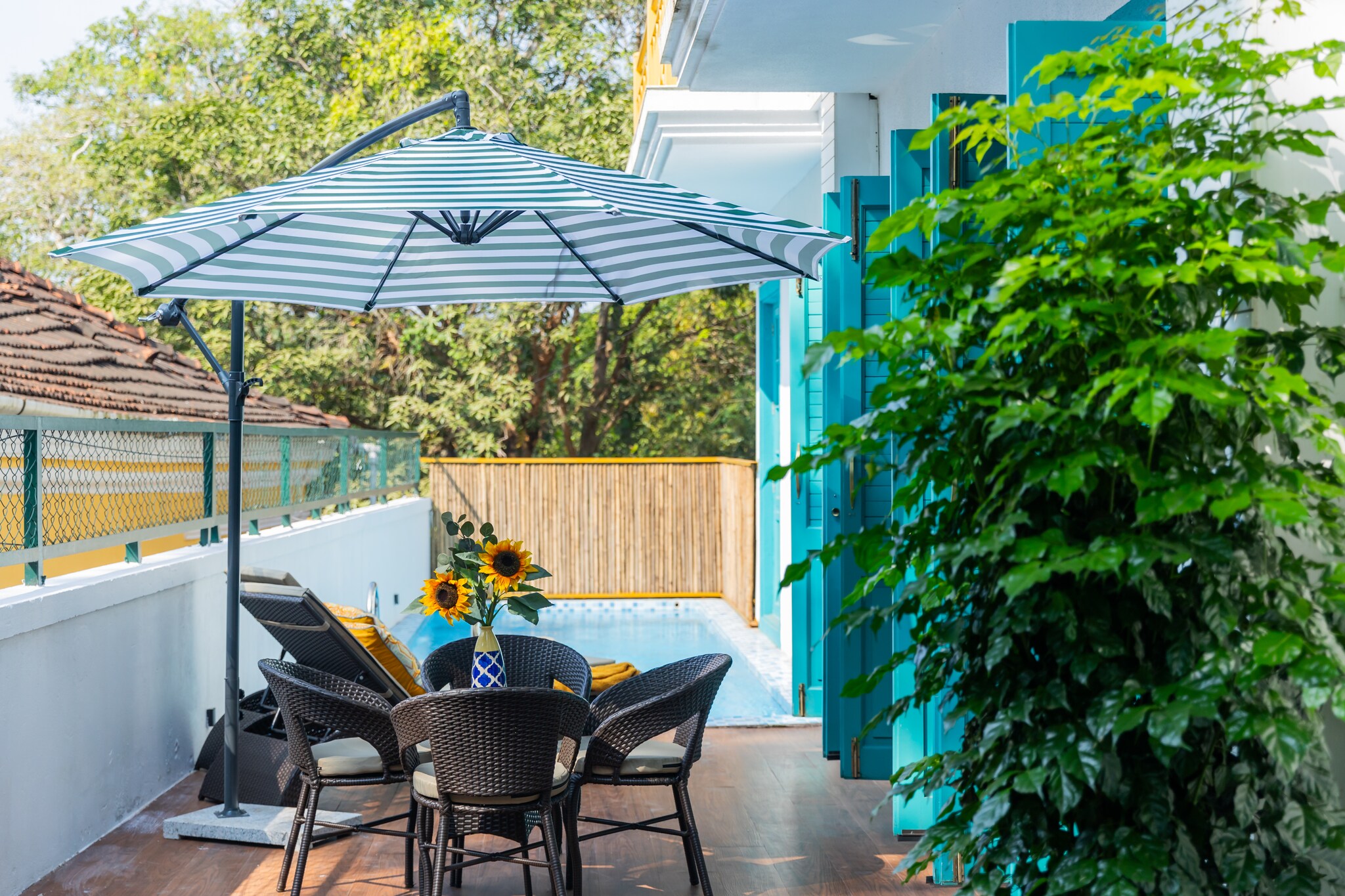 Ground floor: (Entrance, Living room(TV(flatscreen), seating area, air conditioning), open kitchen(dining table(6 persons), electric kettle, toaster, cooker, oven, microwave, dishwasher, fridge-freezer, dishes and cutlery(Bowls, chopsticks, plates, cups, etc.), Cooking basics(Pots and pans, oil, salt and pepper)), Bedroom with bathroom(double bed, TV(flatscreen), shower, washbasin, toilet, air conditioning), Dedicated workspace)\n\nOn the 1st floor: (Bedroom with bathroom(double bed, TV(flatscreen), shower, washbasin, toilet, balcony, air conditioning), Bedroom with bathroom(double bed, TV(flatscreen), shower, washbasin, toilet, balcony, air conditioning), Dedicated workspace)\n\nwireless music system, shower(outside), washing machine, garden, BBQ(on request), parking, private outdoor pool, iron, hairdryer, lounge set, drying cabinet, Essentials(Towels, bed sheets, soap and toilet paper)