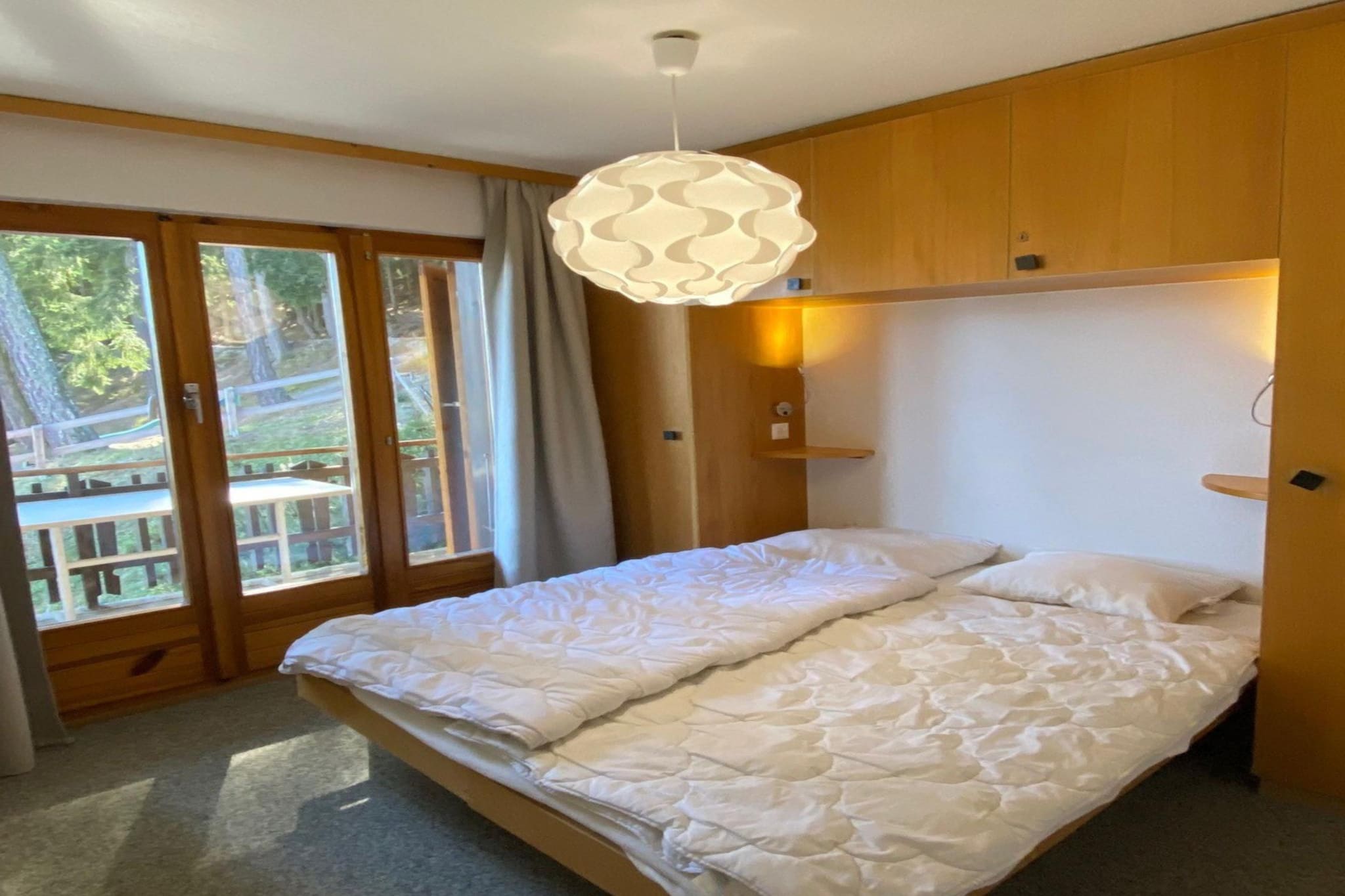 Ground floor: (Living room(double sofa bed, TV(cable, flatscreen, satellite), decorative fireplace, radio), open kitchen(electric kettle, coffee machine(filter), oven, microwave, dishwasher, fridge, freezer, dishes and cutlery(Bowls, chopsticks, plates, cups, etc.)), bedroom(double bed), bedroom(single bed, single bed, bunk bed), bedroom(single bed, single folding bed), bathroom(bath tub, washbasin, toilet), toilet(washbasin, toilet))\n\nski storage, balcony, heating(central), garden furniture, swimming pool(shared with other guests)