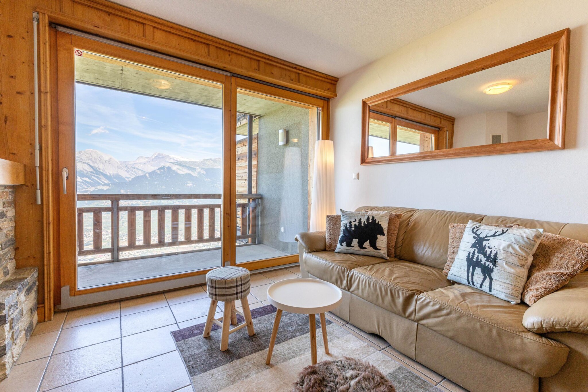 On the 2nd floor: (hallway(bunk bed), Living room(TV(flatscreen, satellite), fireplace, seating area, radio, CD player), open kitchen(hob, electric kettle, toaster, coffee machine(espresso), oven, microwave, dishwasher, fridge-freezer, dishes and cutlery), bedroom(single bed, single bed), bathroom(shower, toilet, hairdryer), bathroom(bath tub, toilet))\n\nski storage, washing machine, balcony, heating(central), garden furniture, lift, iron