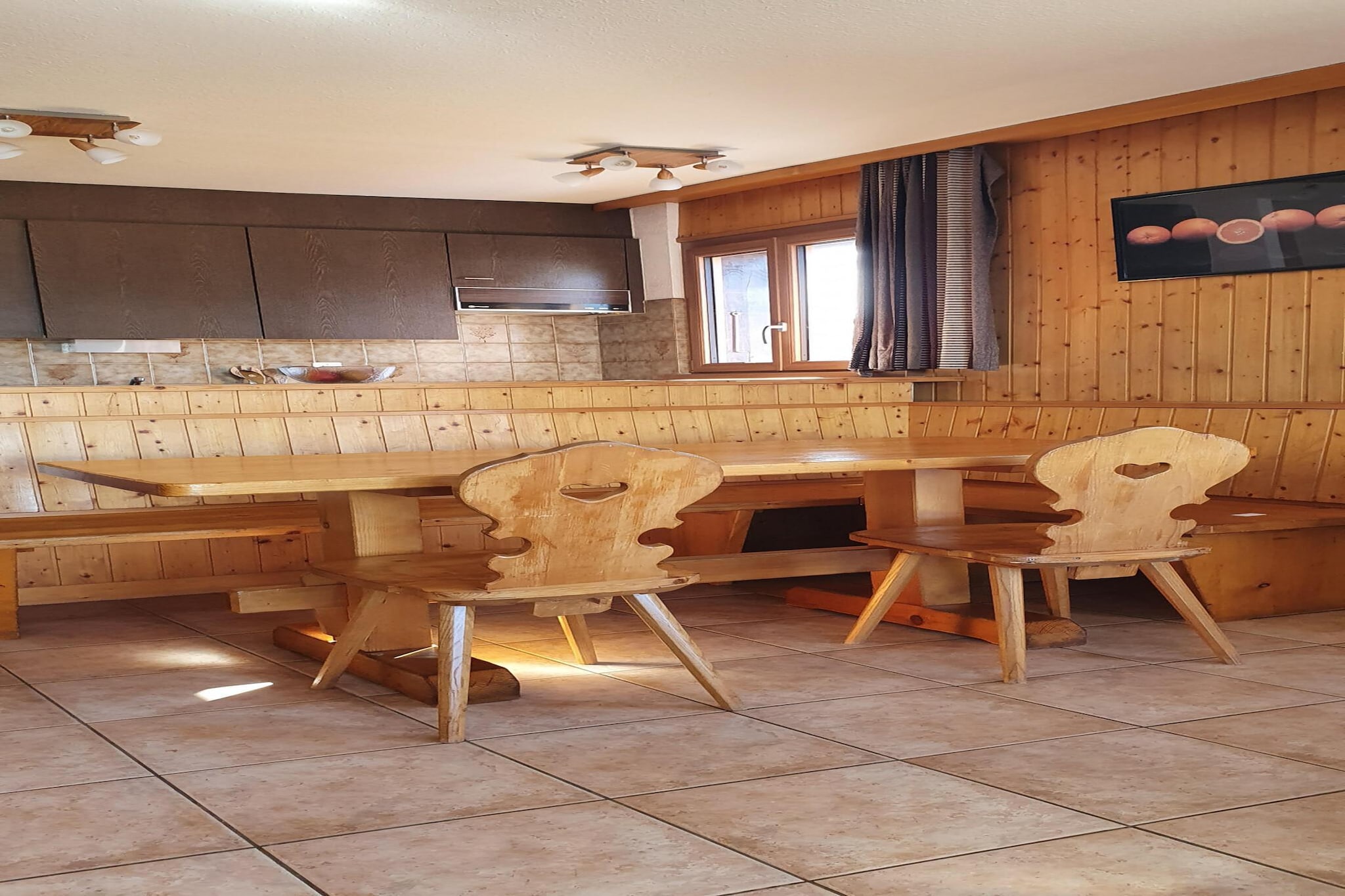 On the 2nd floor: (open kitchen(electric kettle, toaster, coffee machine(filter), oven, microwave, dishwasher, fridge, freezer, Juicer, dishes and cutlery(Bowls, chopsticks, plates, cups, etc.)), Living/bed room(bunk bed(80 x 190 cm), TV(cable, satellite), dining table, seating area, DVD player, radio), bedroom(single bed(90 x 200 cm), single bed(90 x 200 cm)), bedroom(single bed(90 x 200 cm), single bed(90 x 200 cm)), bedroom(double bed(160 x 200 cm)), bathroom(bath tub, shower, washbasin, toilet), bathroom(shower, toilet), Internet access, balcony)\n\nski storage, garage, washing machine, heating(central), garden furniture, parking, swimming pool(shared with other guests), lift, Laundry Package incl.