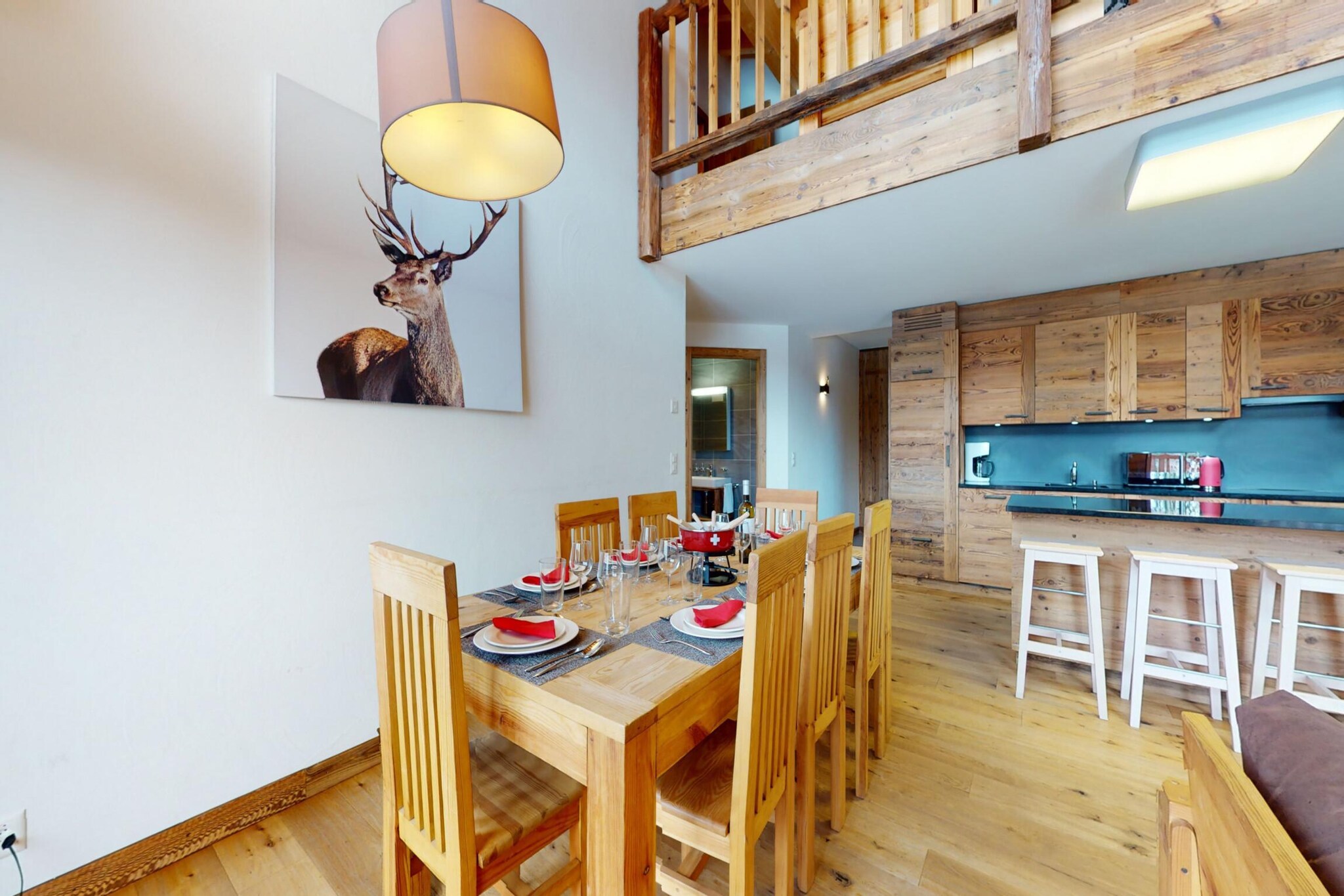 On the 3rd floor: (Living room(double sofa bed, TV(cable, flatscreen, satellite), dining table(10 persons), radio), open kitchen(electric kettle, oven, microwave, dishwasher, fridge-freezer, dishes and cutlery(Bowls, chopsticks, plates, cups, etc.), Cooking basics(Pots and pans, oil, salt and pepper)), bedroom(single bed(90 x 200 cm), single bed(90 x 200 cm)), bedroom(single bed(90 x 200 cm), single bed(90 x 200 cm)), bedroom(single bed(90 x 200 cm), single bed(90 x 200 cm)), bedroom(single bed(90 x 200 cm), single bed(90 x 200 cm)), bedroom(bunk bed), bathroom(shower, washbasin, toilet), bathroom(shower, washbasin, hairdryer), bathroom(bath tub), mezzanine(bunk bed, bunk bed, bunk bed), Internet access)\n\nski storage, washing machine, balcony, heating(central), garden furniture, swimming pool(shared with other guests), lift