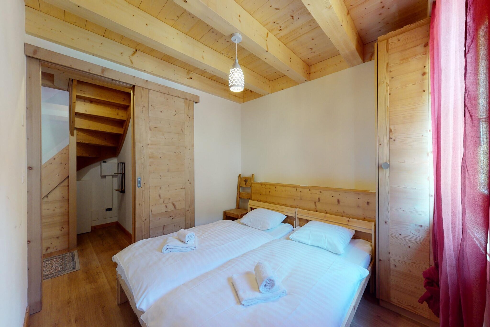 On the 2nd floor: (Living room(double sofa bed, TV(satellite)), open kitchen(electric kettle, toaster, coffee machine, oven, microwave, dishwasher, fridge, freezer, Juicer, dishes and cutlery(Bowls, chopsticks, plates, cups, etc.)), bedroom(single bed, single bed), bedroom(single bed, single bed), bathroom(bath tub, toilet), bathroom(shower, toilet), Internet access)\n\nheating(central), parking