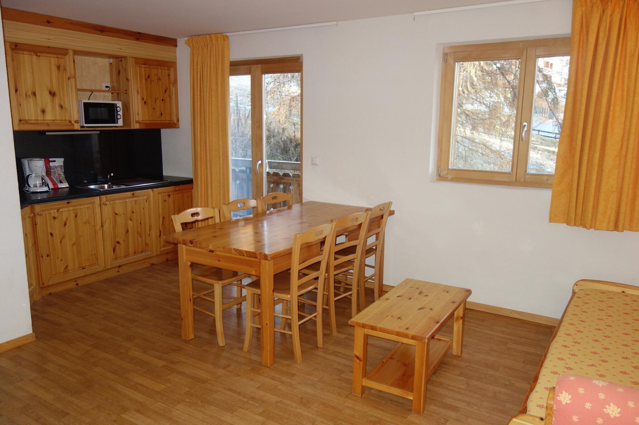 Welcome to this cozy retreat in the heart of Nendaz, Switzerland, just steps away from the village center and the cable cars. This comfortable 3-star apartment spans 49 m² and accommodates up to 6 guests, making it perfect for families or friends seeking an alpine getaway.
Situated just 100 meters from the cable car and close to shops and leisure activities, this residence offers an ideal location for your skiing adventures.
Located on the 4th floor, the apartment features a bright living room with a balcony offering partial views of the slopes, along with a flat-screen cable TV and complimentary Wi-Fi. The open kitchen is fully equipped with a fridge and freezer, dishwasher, microwave, kettle, and coffee machine, providing everything you need for a convenient stay. The apartment includes a double sofa bed in the living room, two bedrooms (one with two single beds and another with two single bunk beds), and a well-appointed bathroom with two showers and a separate toilet. Guests can enjoy the sauna available in the building for an additional charge, as well as laundry facilities, a ski room, and outside parking (subject to availability). Enhance your stay with optional services such as bed linen, end-of-stay cleaning, and gourmet baskets.