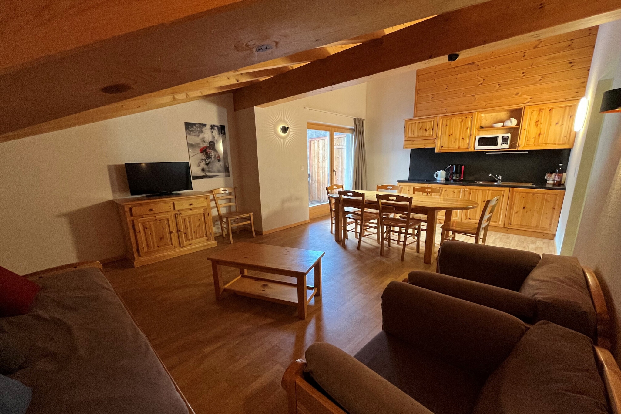 Welcome to your cozy retreat in the picturesque resort of Nendaz, Switzerland. This comfortable 3-star apartment spans 34 m² and can accommodate up to 8 guests, making it perfect for families or groups of friends. Located on the 2nd floor, the apartment features a bright living room with a balcony offering partial views of the slopes, a flat-screen cable TV, and complimentary Wi-Fi. The open kitchen is well-equipped with a fridge, freezer, dishwasher, microwave, kettle, and coffee machine.
Situated just 100 meters from the cable car and close to shops and leisure activities, the residence is ideally located for a fantastic ski holiday.
The layout includes a bedroom with two attached single beds, another bedroom with two separate single beds, and an entrance hall with two bunk beds. There are two bathrooms—one with a shower and one with a bath, along with a separate toilet, ensuring ample facilities for your group. Additional amenities include access to a sauna (available for an extra charge), laundry facilities, a ski room, and an outdoor parking space (indoor parking is also available for an additional fee). Pets are welcome, making it a great option for everyone in the family. Enhance your stay with optional services like bed linen, end-of-stay cleaning, and gourmet baskets.