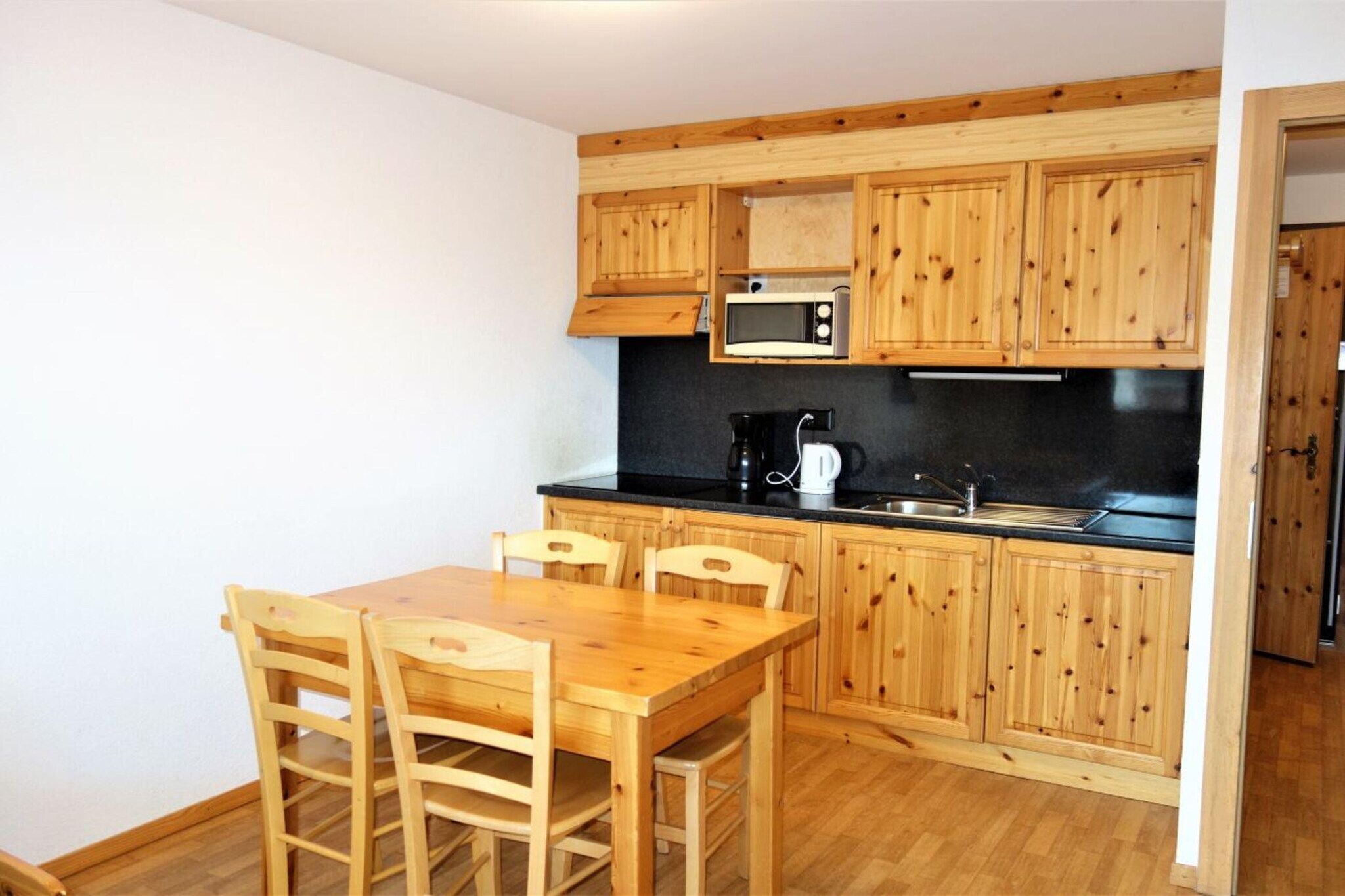 Welcome to your charming 3-star flat located in the picturesque village of Nendaz, right in the heart of the 4 Valleys. This comfortable 34 m² accommodation sleeps up to 4 guests and offers a fantastic ski-in/ski-out experience, just 100 meters from the cable car. Enjoy beautiful valley views from your living room, which features a balcony, flat-screen cable TV, and WiFi—perfect for unwinding after a day on the slopes. The open-plan kitchen is equipped with a fridge, microwave, dishwasher, and coffee machine for all your culinary needs.

The modern residence is ideally located next to the cable car and ski slopes, with shops and leisure facilities just a short walk away—only 100 meters to the cable car and 200 meters to Spa des Bisses.

The layout includes a living room with a sofa bed (2x 80x200), a bedroom with two single beds (90x200), a bathroom with a bath, and a separate toilet. Additional features include a dining room, a ski room, and outdoor parking (subject to availability).
Within the residence, you’ll have access to a sauna (extra charge) and laundry facilities (extra charge). Pets are also welcome! 

Please note that a tourist tax and deposit will apply during your stay. Enjoy exclusive discounts on equipment rentals and local services throughout your stay.