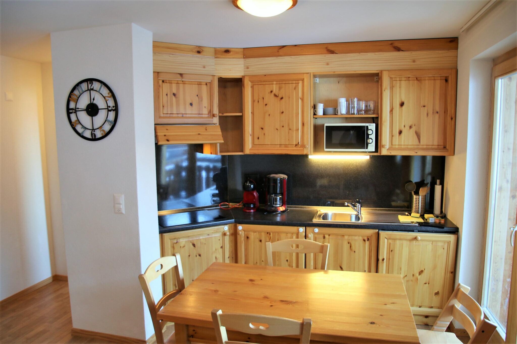 Discover a charming 3-star flat in the stunning resort of Nendaz, situated in the heart of the 4 Valleys. This inviting 41 m² accommodation comfortably accommodates up to 6 guests and boasts a fantastic ski-in/ski-out location, just 100 meters from the cable car. Take in the magnificent valley views from your living room, which features a balcony, flat-screen cable TV, and WiFi—ideal for unwinding after an exciting day of skiing. The open-plan kitchen is fully equipped with a fridge, microwave, dishwasher, and coffee machine for your convenience.
This modern residence is perfectly located near the cable car and ski slopes, with shops and leisure activities just a short stroll away.
The layout includes a living room with a sofa bed (2x 80x200), a bedroom with two single beds placed side by side (90x200), and a hall with a single bunk bed (90x200). You'll also find a bathroom with a bath and a separate WC. Additional features include a dining area, a ski storage room, and outdoor parking (subject to availability). Guests at the residence can enjoy a sauna (for an extra charge) and laundry facilities (also at an extra charge). Pets are welcome, making it a great choice for the whole family! Please be aware that a tourist tax and a security deposit will be applicable during your stay. Take advantage of exclusive discounts on equipment rentals and local services throughout your stay. Enhance your experience with optional services like bed linen, end-of-stay cleaning, and gourmet baskets.