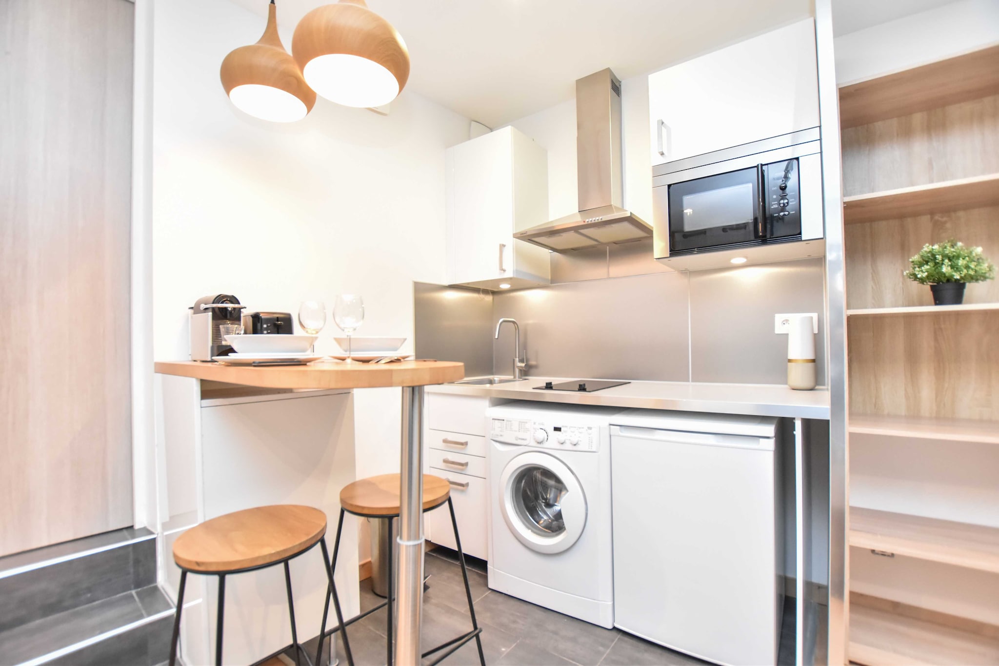 On the 1st floor: (Kitchen(stove, electric kettle, toaster, coffee machine, oven, microwave, dishes and cutlery), Living/bed room(Bed Linen, Desk, single sofa bed, double bed, TV), bathroom(shower, toilet, Towels/Sheets (Incl.), shampoo))\n\nHot Water, Internet Access DSL, Wardrobe, heating, iron, Essentials, Cooking basics