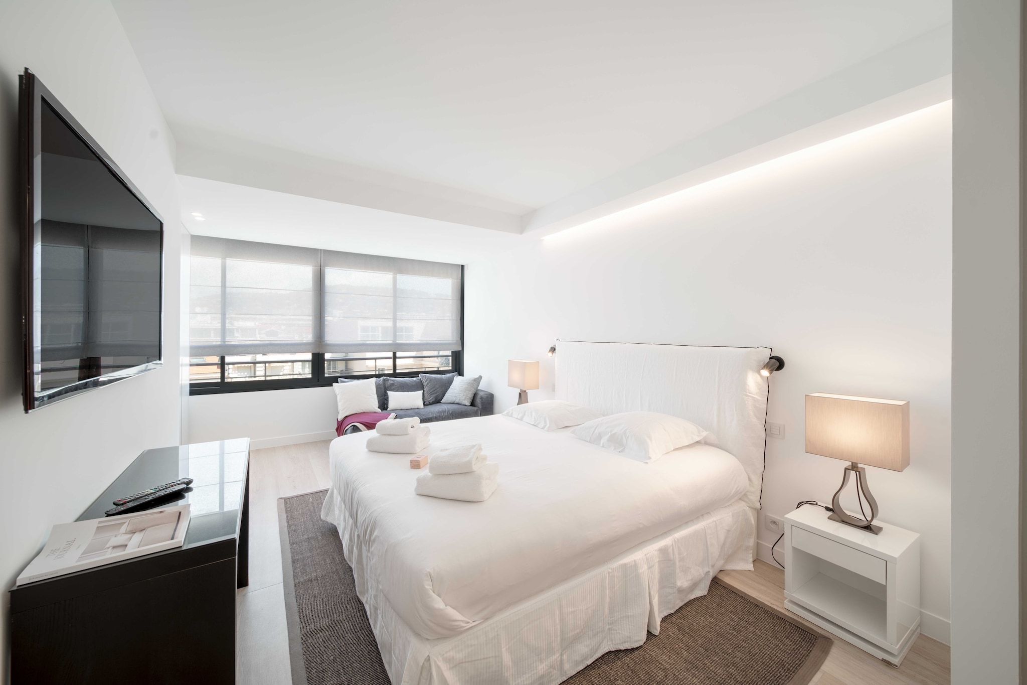 Ground floor: (Living room(TV), open kitchen(stove, electric kettle, toaster, coffee machine, oven, microwave, dishwasher, fridge, dishes and cutlery, Cooking basics), Bedroom with bathroom(double bed, shower, toilet), Bedroom with bathroom(double bed, shower, toilet), Bedroom with bathroom(double bed, shower, toilet), Bedroom with bathroom(double bed, double bed, shower, toilet))\n\nBed Linen, Desk, Elevator, Hot Water, Internet Access DSL, Wardrobe, First Aid, washing machine, balcony or terrace, heating, air conditioning, iron, hairdryer, Towels/Sheets (Incl.), shampoo, Essentials