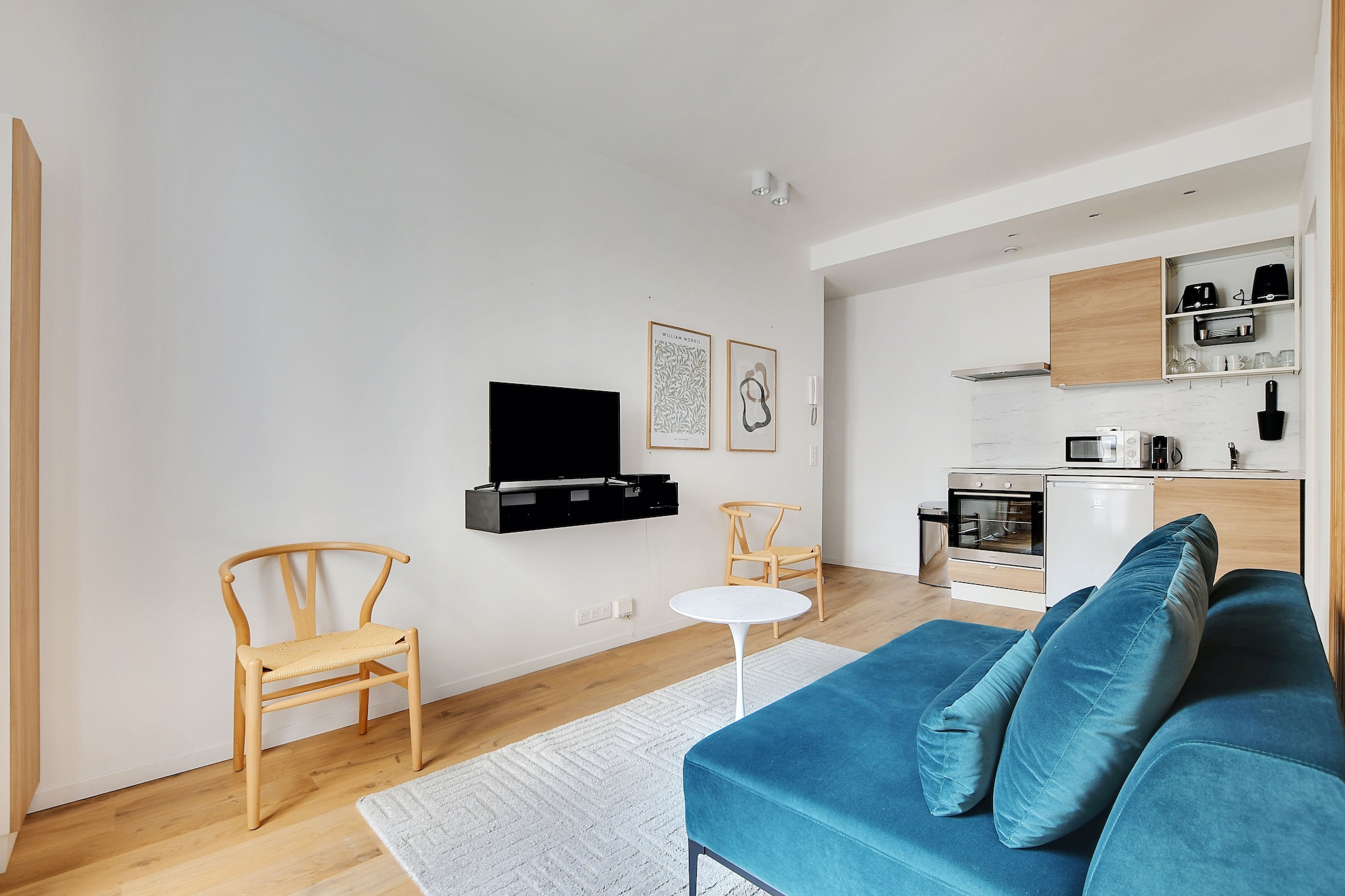 On the 3rd floor: (Kitchen(stove, electric kettle, toaster, coffee machine(espresso), oven, microwave, fridge, electric hot plates, dishes and cutlery, Cooking basics, Wine glasses), Living/bed room(double bed), bathroom(Hot Water, shower, hairdryer, shampoo))\n\nDesk, Internet Access DSL, Wardrobe, storage, First Aid, Play area, TV, heating, iron, Towels/Sheets (Incl.), Essentials, Carbon monoxide detector, Cleaning Disinfection, Downtown, Enhanced cleaning practices, High touch surfaces disinfected, Long term stays allowed, Town