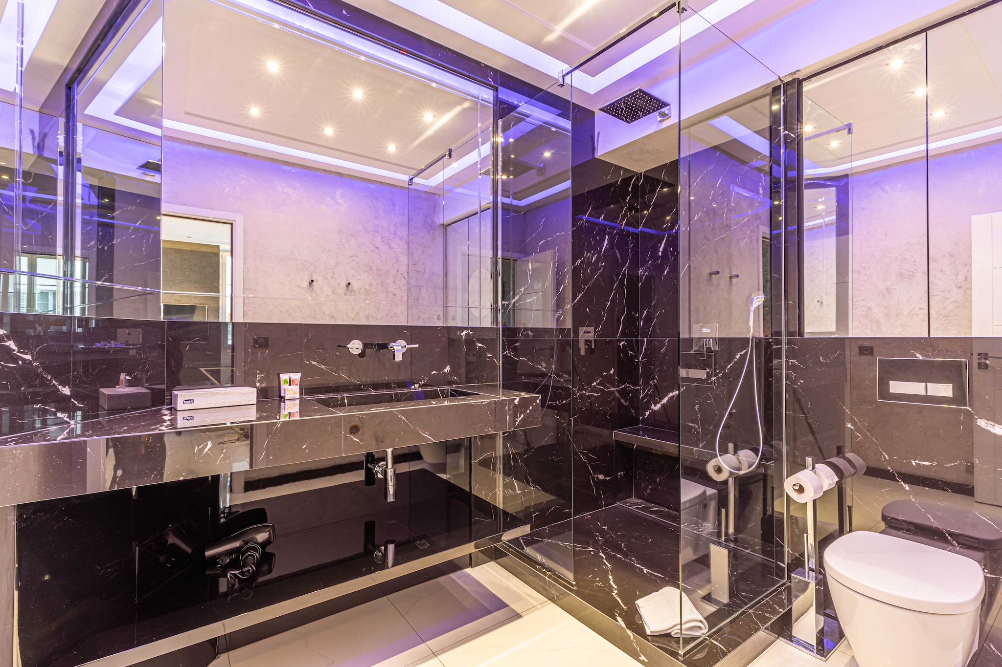 On the 2nd floor: (Living room(Wardrobe, single sofa bed, TV), Kitchen(dining table, stove, electric kettle, toaster, coffee machine, oven, microwave, dishwasher, fridge, electric hot plates, dishes and cutlery, Wine glasses), bathroom(shower, washbasin, toilet))\n\nBed Linen, Elevator, Hot Water, Internet Access DSL, First Aid, Play area, cot, heating, air conditioning, iron, hairdryer, Towels/Sheets (Incl.), parking (paying), shampoo, Essentials, Carbon monoxide detector, Cleaning Disinfection, Enhanced cleaning practices, High touch surfaces disinfected, Long term stays allowed