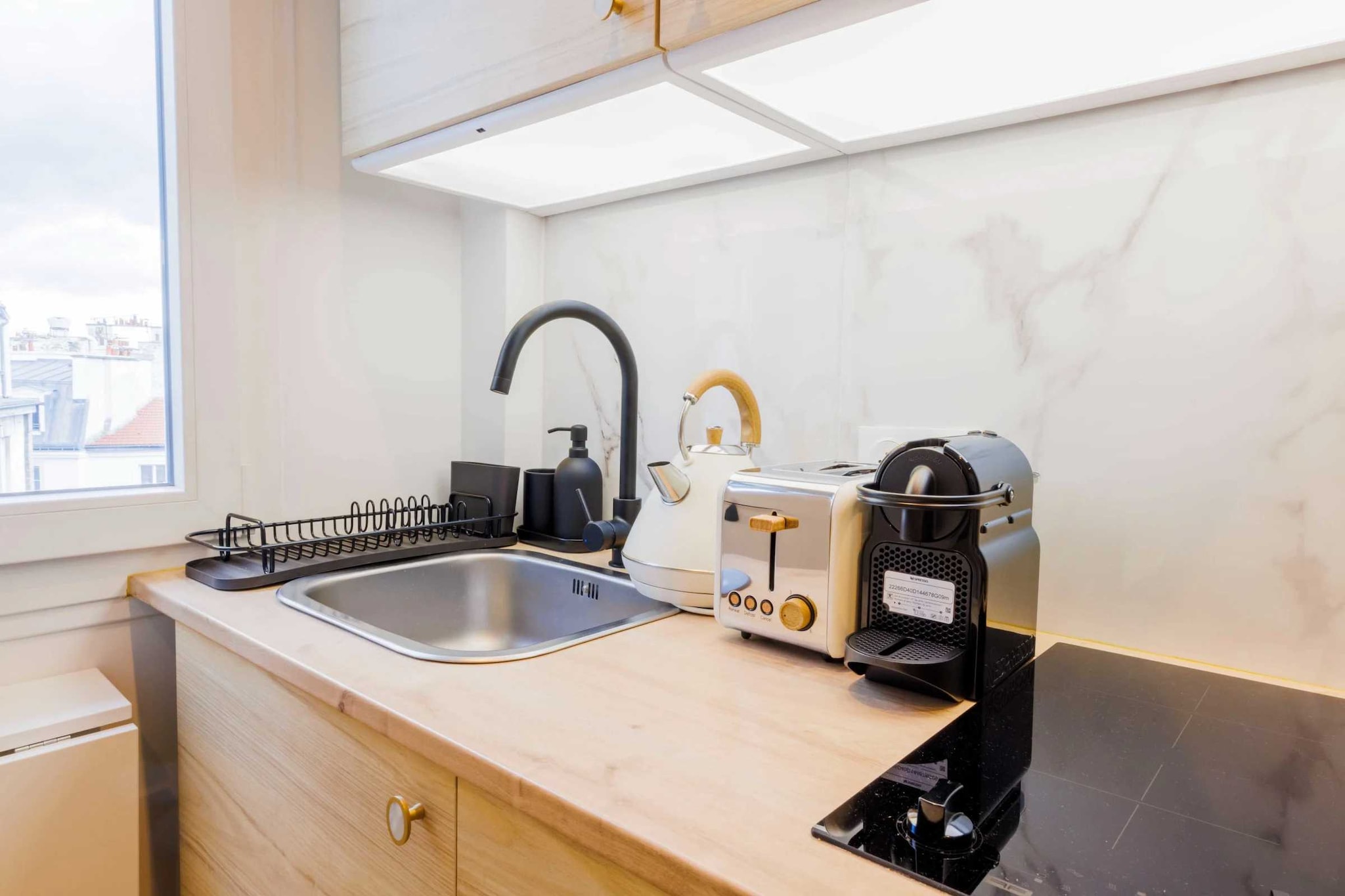 On the 7th floor: (Living room(single sofa bed), Kitchen(stove, electric kettle, toaster, coffee machine, microwave, fridge, dishes and cutlery, Cooking basics), bathroom(shower, washbasin, toilet, hairdryer, Towels/Sheets (Incl.), shampoo))\n\nBed Linen, Elevator, Hot Water, Wardrobe, Internet access, First Aid, Play area, TV, heating, iron, Essentials, Carbon monoxide detector, Cleaning Disinfection, Downtown, Enhanced cleaning practices, High touch surfaces disinfected, Long term stays allowed, Room-darkening shades, Town