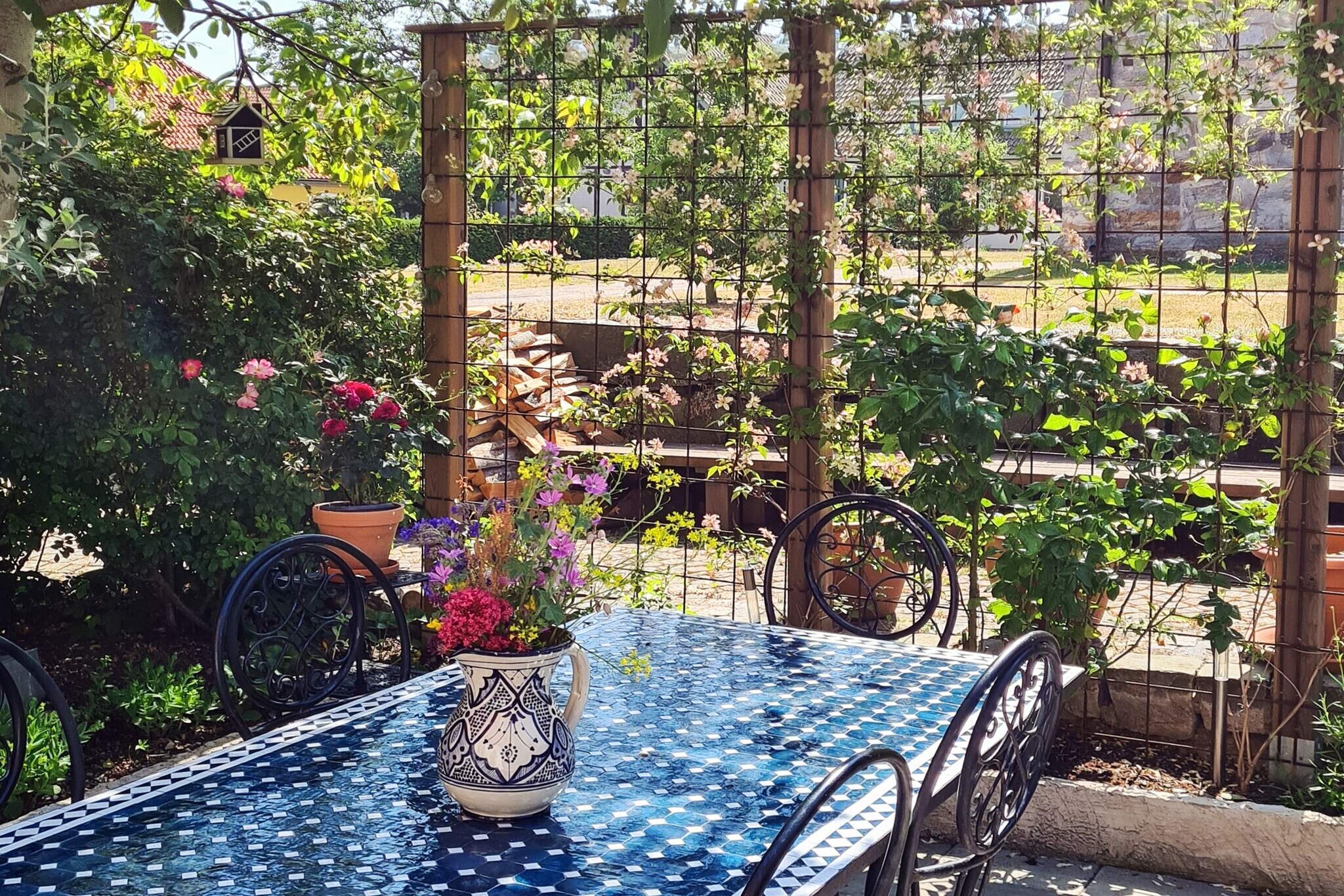 Welcome to a unique and charming street house in the heart of Simrishamn, just a few hundred meters from the glittering coast of the sea. This spacious property offers everything you need for an unforgettable stay. Here you are welcomed by the house owner who shows you around and is happy to tell you what you can experience here. With several social rooms and an elegant dining room, it is the perfect place to gather friends and family. There are well-disposed bedrooms with a total of eight beds that are made for a good night's sleep. Common entrance to upper floor where the so-called "annex" (bedroom) for 4 people is located. A large and tasteful bathroom, an extra toilet and all modern amenities such as a washing machine and tumble dryer. The fully equipped kitchen invites you to pleasant dinners and fellowship. But what really makes this house special are the beautiful details, such as the two atmospheric tiled stoves (to be used only in consultation with the owner!) and the cozy courtyard, where you can enjoy the view of an enchanting church. This is a place for you who can value and care about both the house and the place. Respect private spaces/markings. The apartment on the upper floor has a permanent tenant. Let this charming street house be your oasis for a lovely stay in Simrishamn! Here, during the summer, there is also a market stall, which is very cozy. You have incredibly nice beaches along Ystad, Löderup beach and Sandhammaren. You also have Ystad and Tomelilla if you want to shop, eat well or just walk around. You have a very popular Café down here "Olof Viktors" which is highly recommended. Feel free to also visit the Old Bakery - Örnahusen, Fredrik på Eklaholm and Glimmingehus. A few miles away you have Ale's stones, Kåseberga and much more. For the children there is a lot to explore such as Skåne Zoo, Ystad Zoo and Tosselilla Summerland and much more. You can even take the ferry from Ystad to Bornholm. Also take the opportunity to fish in all of Skåne's wonderful lakes. Good to Know Bed linen and towels are not included. Guests must bring their own. Cleaning is included in the rental price. However, guests are responsible for doing the dishes and taking out the trash. A deposit is paid to the homeowner upon arrival and will be refunded if the cottage is left in good condition.