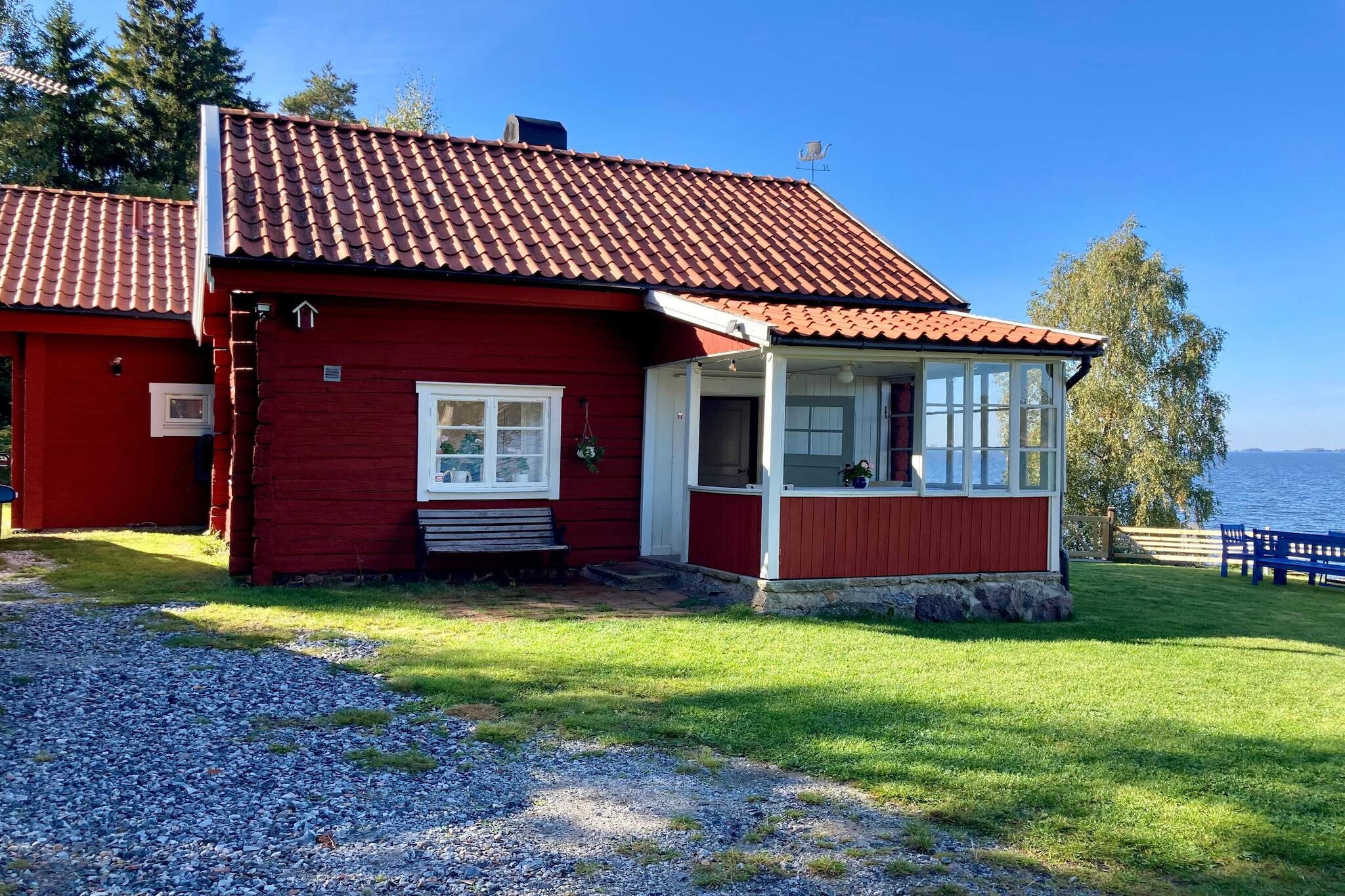 Do you dream of a vacation in a cottage with panoramic views of the lake? Then you've come to the right place. Right on the edge of Southern HjÃ¤lmaren, near the small village of LÃ¤ppe in SÃ¶dermanland, lies this paradise. The cottage, originally from the 19th century, has been renovated and extended while preserving its original charm. The property is on multiple levels, with fencing both towards the lake and the road, which is occasionally trafficked. In the older part of the cottage, you'll find an entrance through a beautiful original glass veranda, where you can enjoy your morning coffee. From here, you enter a hallway with stairs leading up to the charming attic loft with three single beds, and access to the kitchen, where the stove and fridge/freezer are new, providing everything you need for a comfortable stayâ€”though we do wash dishes by hand. Moving into the dining room, there is plenty of seating around the table and a charming open fireplace where you can make a cozy fire on chilly days. In the newly built extension, there is an additional entrance. Here you'll find a fresh bathroom equipped with a washing machine and another bedroom with a very comfortable double bed. The living room has an open ceiling up to the roof and large windows facing HjÃ¤lmaren. Upstairs, there is a loft with a double bed. On the lakeside, there is a wonderful terrace with garden furniture, perfect for lingering late into the evening to enjoy the view. A charcoal grill is available for your use. Stairs lead down to the lake where youâ€™ll find a private dock, perfect for sunbathing and swimming, with a convenient swimming ladder. If you want to head out on the lake, there's a rowboat available, located beside the property in a small bay. For services, shops, and restaurants, VingÃ¥ker is about a 20-minute drive away. At HjÃ¤lmaregÃ¥rden, you'll find a large sandy beach, as well as a simple cafÃ©/pizza place and a kiosk open during the summer. For golf enthusiasts, VingÃ¥ker Golf Club is about 20 minutes away, with a beautiful 18-hole course by Lake Kolsnaren. Warmly welcome!