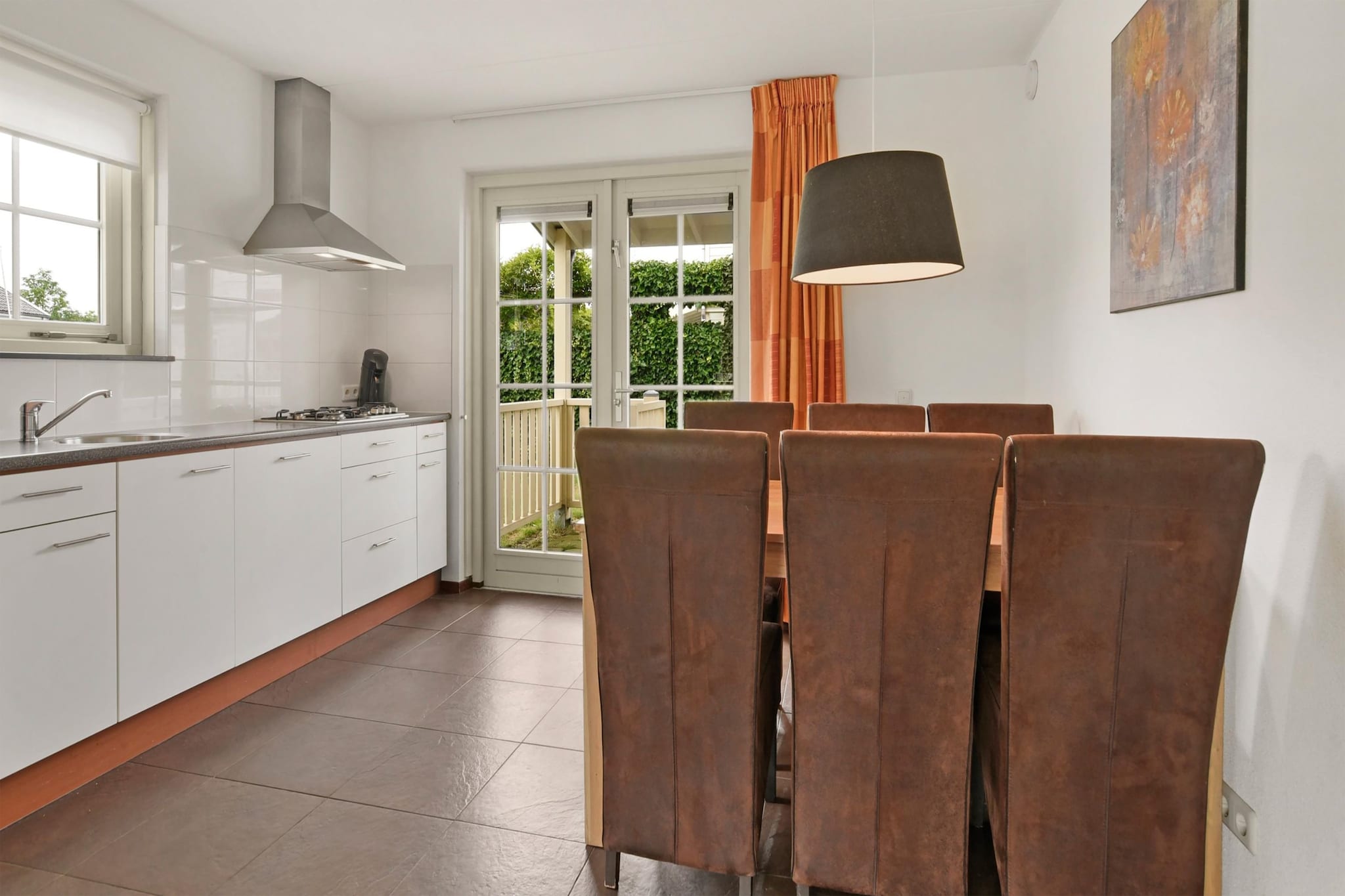 Discover the beauty of South Holland from your private waterfront bungalow at Zuytland Buiten. Nestled in a peaceful, nature-rich park, this cozy home offers a serene retreat with a jetty right in your backyard—perfect for fishing or sipping your morning coffee by the lake. The veranda and open-concept living area provide the ideal setting for unwinding after a day outdoors, while the fully equipped kitchen makes home-cooked meals a breeze.
Inside, you’ll find a thoughtfully designed layout with three bright bedrooms on the first floor—perfect for families or small groups. The modern bathroom is clean and functional, and large windows throughout the home invite natural light and stunning views of the surrounding water. Whether you're spending quiet evenings indoors or enjoying sunset dinners on the terrace, comfort and calm define your stay.
Step outside and explore the best of the region. The sandy shores of Rockanje and Ouddorp are just a short drive away for sun-filled days or seaside dining. For a cultural fix, Rotterdam’s museums, shops, and nightlife are only 30 minutes away. Prefer something closer? The nearby towns of Brielle and Hellevoetsluis offer historic charm and great local restaurants—including a beloved pancake house just 200 meters from the bungalow. Please note: this property is pet-free, ensuring a peaceful and allergy-friendly environment for all guests.