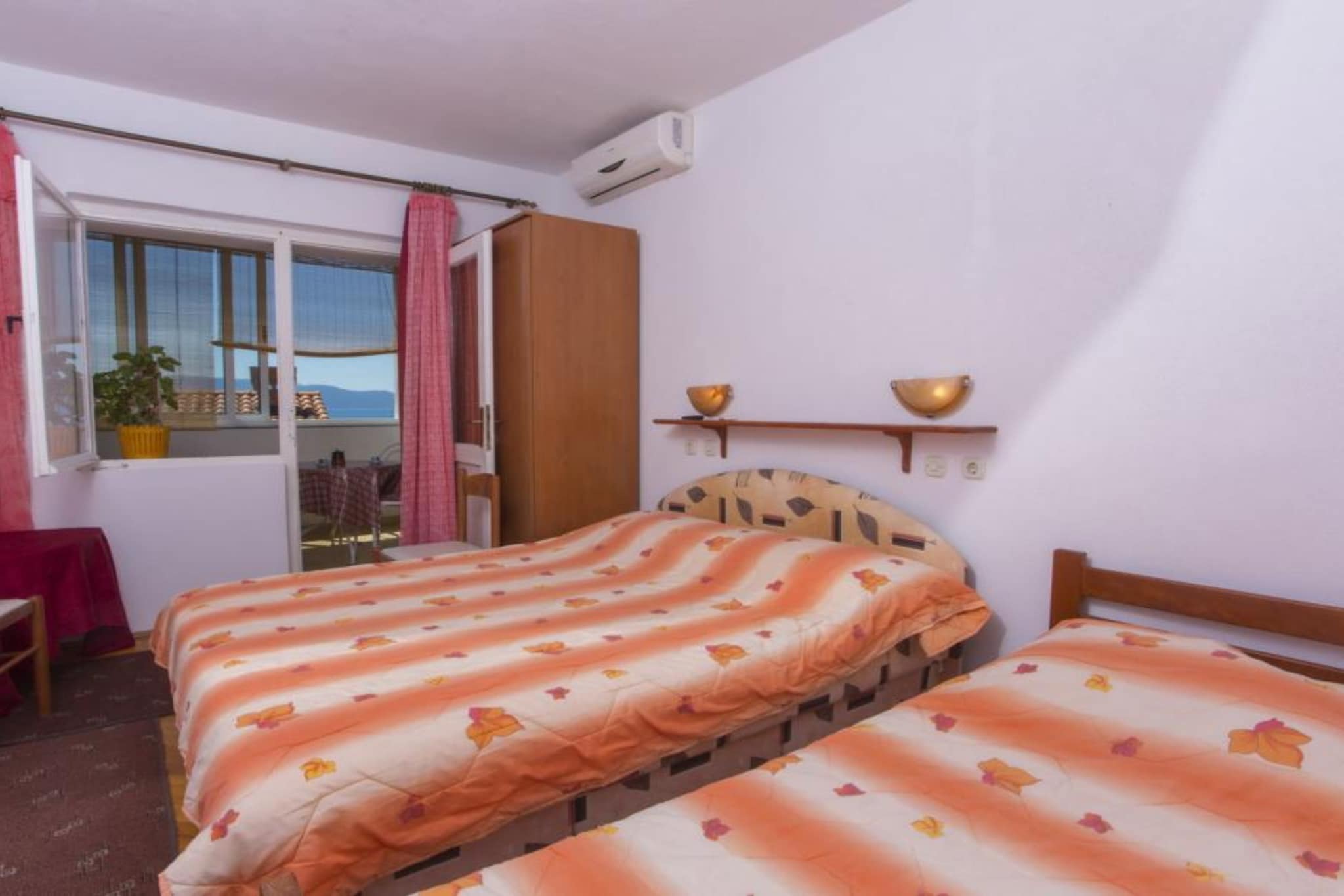 Triple Room with Private Balcony (A3)-Schlafzimmer