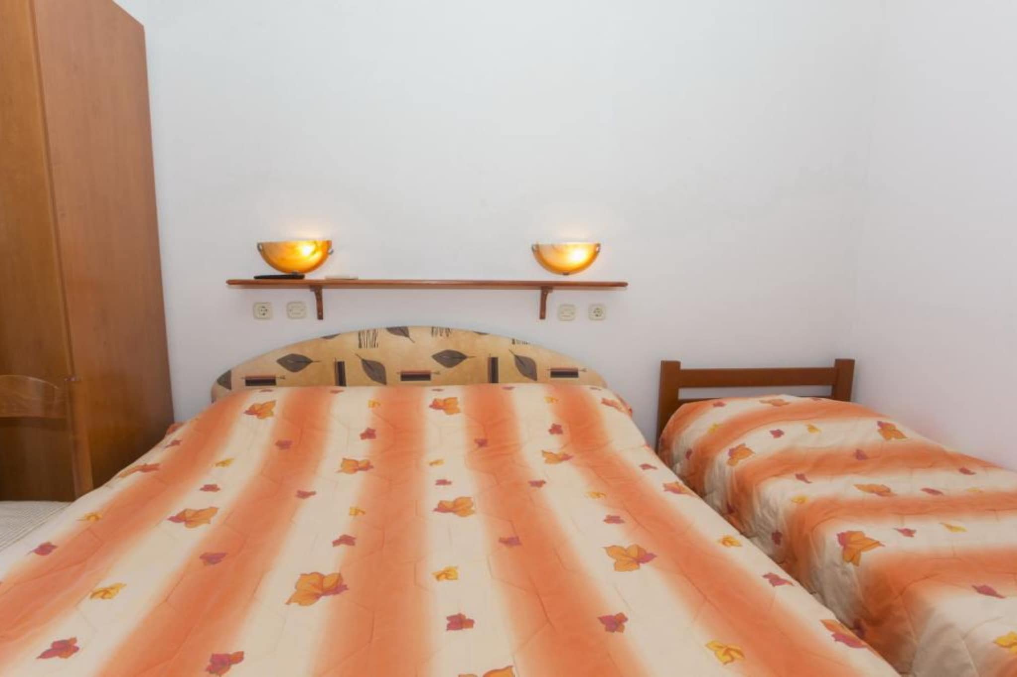 Triple Room with Private Balcony (A3)-Schlafzimmer