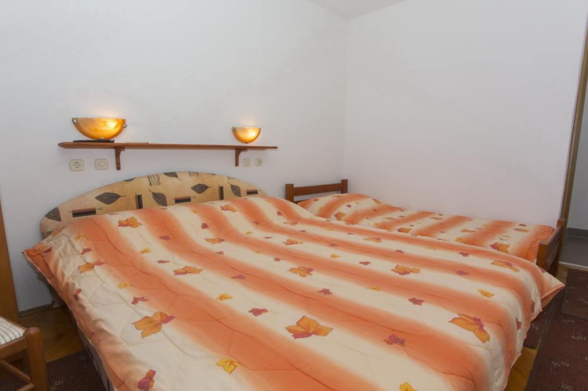 Triple Room with Private Balcony (A3)-Schlafzimmer