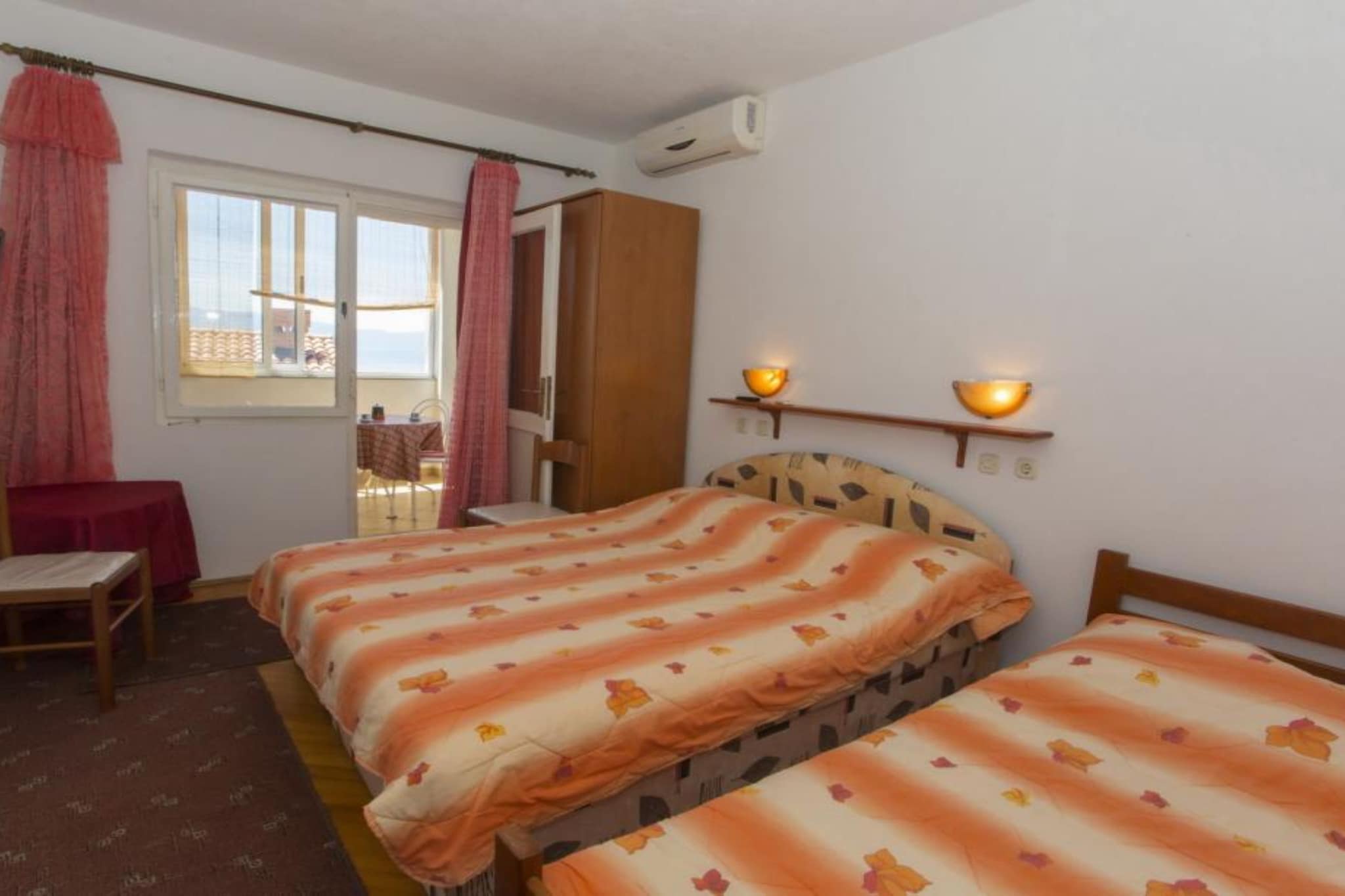 Triple Room with Private Balcony (A3)-Schlafzimmer