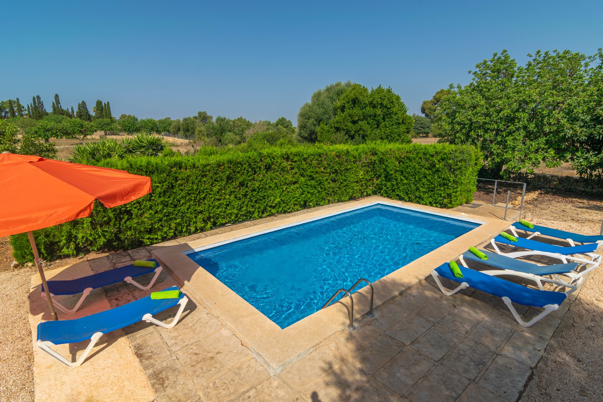 The outdoor area of the property is ideal to enjoy the Mediterranean climate. The private chlorine swimming pool measures 4mx8m and has a depth between 1m and 1.85m. Around the pool there are sun loungers where you can relax while sunbathing, a barbecue area and a veranda with table and chairs where you can enjoy a delicious meal with your companions. The property is fenced and offers total privacy. 

The interior of the two-storey house exudes authenticity and tradition. On the ground floor, there is a living room with fireplace and TV with satellite channels; the dining room is independent and can accommodate all the inhabitants of the house. The kitchen has a gas cooker, as well as a fireplace for colder days. The first bedroom is on the ground floor, with 2 single beds. A bathroom with shower completes this level. On the first floor there are 3 more bedrooms, two with a double bed each and the last one with twin beds. There is another bathroom with shower on this floor. An outside bathroom with shower, washing machine, iron and ironing board, and cot and high chair if you are travelling with your baby complete the accommodation.

The house is located in the quiet area of Son Negre, surrounded by nature and with few neighbours. It is an ideal place for a holiday in a natural environment. The house of 200 m2 is on a plot of 14.700 m2 surrounded by the Mediterranean countryside. Nearby, there are paths for walking or cycling. The village of Felanitx is a 5 minute drive away, where you will find supermarkets, bars, restaurants and more. The beach of Portocolom, the Natural Park of Mondragó, Es Trenc and Colònia de Sant Jordi can also be easily reached by car. Palma is only 46 km away, offering a wide variety of cultural and historical leisure activities. Consult the advertiser for possible charges. Pets are welcome. The holding of events is forbidden. There is exterior parking for 7 cars.  
Distances
Beach: 17 km - Cala Sa Nau
Airport: 42 km - Palma de Mallorca
Golf course: 15.4 km - Vall d'Or
Town: 5.5 km - Felanitx
Train station: 18.7 km - Manacor
Bus stop: 5.5 km - Felanitx
Ferry: 47.9 km - Felanitx
Hospital: 19.5 km - Hospital de Manacor
Tourist license: ETV/1591There's a mandatory tourist tax in Balearic Islands, called Ecotasa. All guests, except people under 16 years, have to pay this tax. The amount varies between 0.55€/night and guest during the low season and 2.2€/night and guest during  the high season .The tax is reduced by half from the 9th day for your stay. Homerti - Central de Reservas CR/33