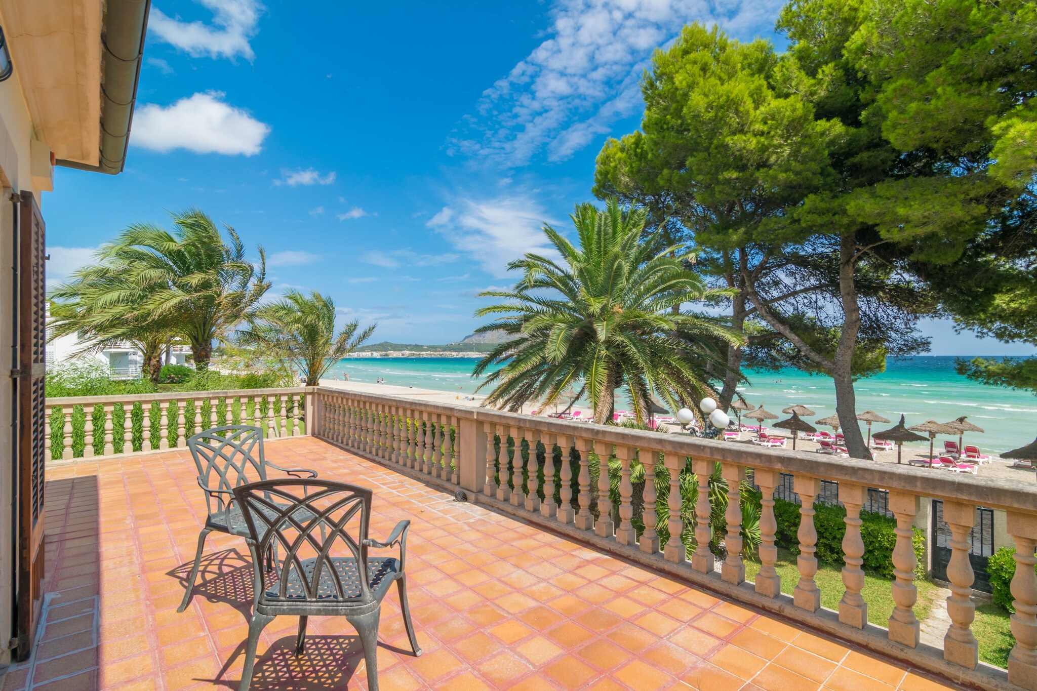 The fabulous outdoor area counts with a garden with direct access to the beach, three terraces with sea view, a well-furnished porch and a barbeque.
The 220m2 2-storey house counts with 4 bedrooms: 1 on the ground floor (with a double bed) and 3 on the first floor (two with a double bed, of which one counts with an en-suite bathroom with a shower, and 1 with 2 individual beds). All bedrooms count with air conditioning. There is a possibility for one extra person to sleep on a sofa-bed. On request, there are two baby beds and a highchair available. There are 2 bathrooms with a bath tub, for general use (one on each floor).
The cozy living- and dining room counts with 2 sofas, satellite TV, a dining table, a fire place and air conditioning. The independent kitchen works with a hob and counts with all necessary utensils to prepare a perfect family dinner. You will also find a washing machine, a tumble dryer, an iron and an ironing board. The whole house is equipped with central heating.
The house is situated on the beach of Port d'Alcúdia. It's situation is perfect, with everything you might need within walking distance: supermarket, shops, restaurants, bars, pharmacy, bank, etc.
The fine, white sandy beach of Alcúdia covers quite a few kilometers, all the way from the harbor of Alcúdia to Can Picafort. Nearby, you will find the beach of Playa dels Capellans, where you can enjoy a paella or a cocktail in any of the well-known beach bars, while watching the sundawn. Nearby, you will find some interesting places to visit, as, for example, the Albufera wetland, Pollença with it's cozy town square and the Calvari stairs, and small, quiet seaside villages as Colònia the Sant Pere. Don't forget to visit Alcúdia's old town, with it's cobbled streets, the church and the ruins of the old roman city and amphitheater. Tuesdays and Sundays there is a market in Alcúdia and the village transforms into a bustling and vibrant place.
The house counts with two safety-deposit boxes and an alarm. Consult the advertiser for possible charges. Pets are not allowed. The holding of events is forbidden. There is exterior parking for 1 cars. There are parking space for 1 cars in the garage.
Distances
Beach: 0.05 km - Port d'Alcúdia
Airport: 69 km - Son Sant Joan
Golf course: 5 km - Golf Alcanada
Town: 2 km - Alcúdia
Train station: 14 km - Sa Pobla
Bus stop: 0.2 km - Apmt. Concha del Lago
Ferry: 3 km - Port d'Alcúdia
Hospital: 2 km - Hospital de Muro
Tourist license: ETV/6506Single Rental Registry: ESFCTU00000704300029651900000000000000000000ETV/65069