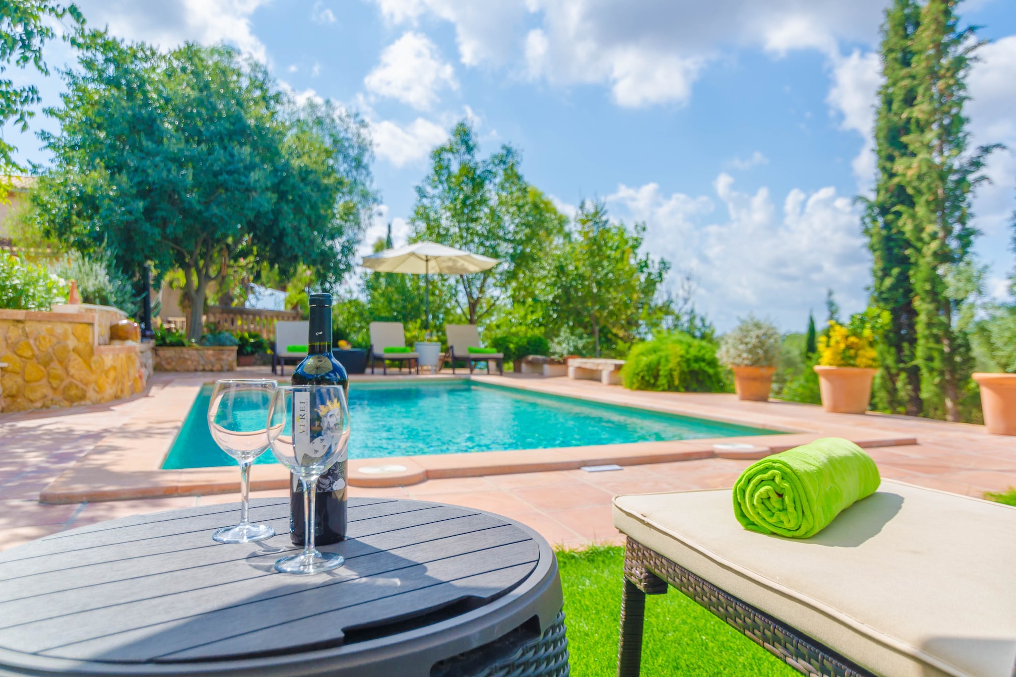 Welcome to this beautiful house, with a private 8x4 salty swimming pool, with a deph ranging going from 1 to 1.70m, where you will swim while enjoying the wonderful landscape, the extraordinary views of the close  mountains of the tramuntana close to Bunyola. The swimming pool is surrounded by grass and you can sunbathe at one of the six hammocks. An external shower is ideal for a quick refresh. There is a fantastic covered terrace just close to the entrance, and a terrace covered with canes, both ideal places to enjoy a nice dinner with your loved ones. Also, you will love the little house beside this area equipped with a kitchen, barbecue and an oven!

The property, traditionally decorated, is divided in two floors. Just coming in, you will find an unified room composed by a living-room with a fireplace and satellite TV, the dining-room area and the big gas equipped kitchen, where you will find all the necessary amenities you might need to prepare your favourite dishes. From here there is a direct access outside. Obviously, there is an independent laundry area with a washing machine, an iron and an ironing board. You dispose of a nice bedroom with a double bed and a bathroom with a shower as well on the same level. Upstairs, there are two further bedrooms, one with a double bed and the last one with two twin beds and direct access to a terrace. All the bedrooms have a wardrobe each and A/C. If you travel with a baby, we will provide you a cot and a high chair on demand. There is gas central heating for the winter season.

Bunyola is a very quiet village located at La Serra de Tramuntana, very near to Palma city. From Bunyola, you can do different trips and routes around the Tramuntana area and its unforgettable villages around like Sóller, Biniaraix, Fornalutx, etc. Also, you will find all the necessary services you might need during your stay, like restaurants and bars, or supermarkets. We recommend a visit to Palma Cathedral, La Seu, and have a walk through the little streets full of flagstones at the old town, or go shopping. Note: This accommodation is intended for families and guests over 26 years old who are looking for a peaceful stay. Bookings for parties or celebrations are not accepted. A copy of the identification document of all guests will be required to confirm the reservation.  Consult the advertiser for possible charges. Pets are not allowed. The holding of events is forbidden. There is exterior parking for 3 cars.  
Distances
Beach: 19 km - Port del Canonge
Airport: 24 km - Son Sant Joan
Golf course: 4.8 km - Son Termens
Town: 4 km - Bunyola
Train station: 6.7 km - Santa Maria
Bus stop: 1.7 km - Carrer Lledoner, Sa Coma
Ferry: 18 km - Port de Palma
Hospital: 11.3 km - Son Espases
Tourist license: ETV/9507Single Rental Registry: ESFCTU00000702800003918200000000000000000000ETV/95077There's a mandatory tourist tax in Balearic Islands, called Ecotasa. All guests, except people under 16 years, have to pay this tax. The amount varies between 0.55€/night and guest during the low season and 2.2€/night and guest during  the high season .The tax is reduced by half from the 9th day for your stay. Homerti - Central de Reservas CR/33