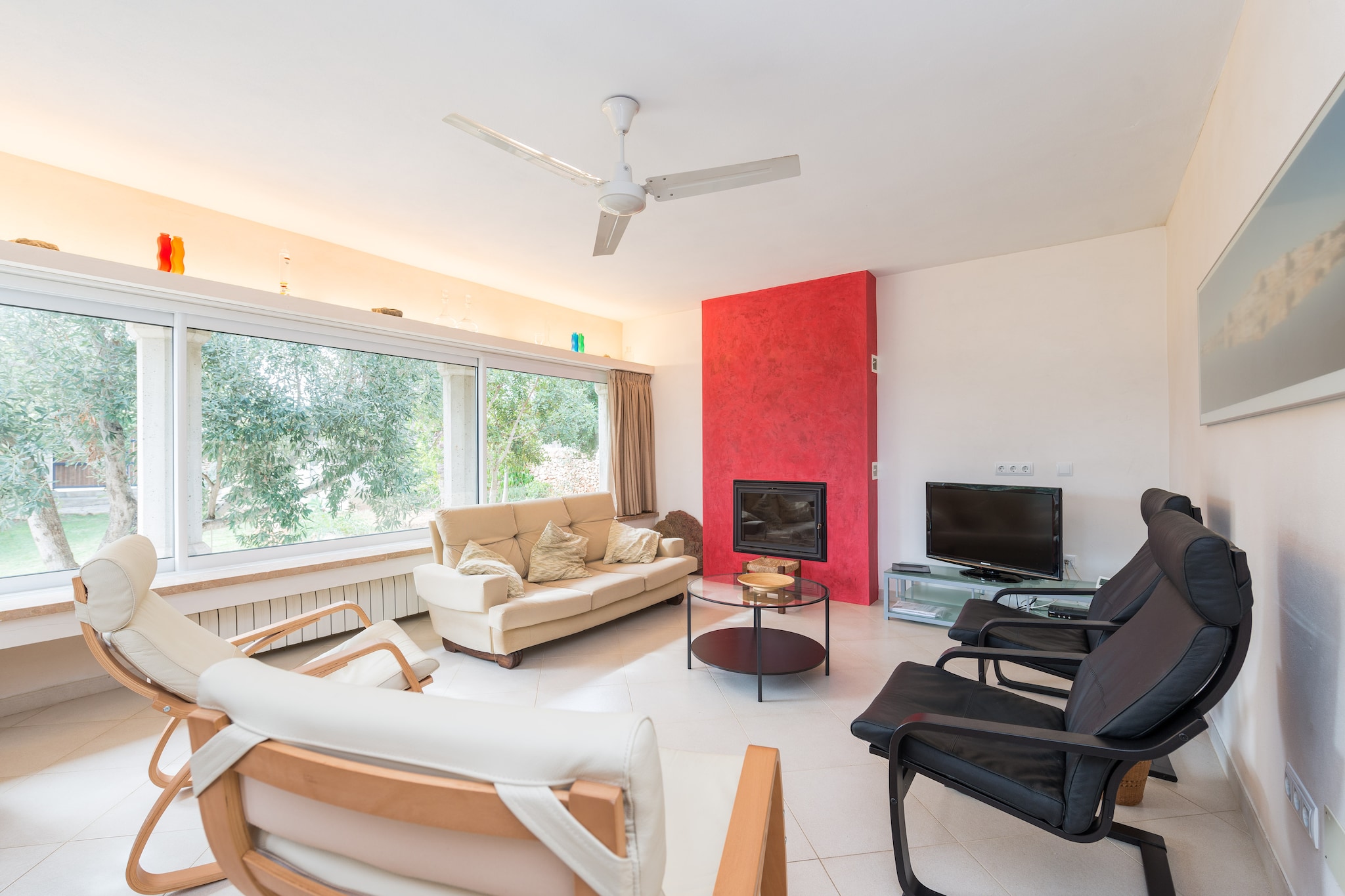 This house disposes of a wonderful grass area, hammocks where you can relax and sunbathe, and different terraces and porchs that surround the house. An external shower is ideal to refresh quickly after a long day at the beach. Later, you can prepare a tasty barbecue with your loved ones.
The property is divided in three floors, including up to three living-rooms, four bedrooms with a wardrobe each, and two bathrooms.
At the ground floor, there is a living-room with big glass windows, where you can relax watching the satellite TV. There is a second living-room with a nice dining-room area, the gas equipped kitchen that preserves the typical majorcan style and a bathroom with a shower. Three of the four bedrooms are also located at this floor, one has a double bed, and another two has two single beds. Two of them have access to a lovely furnished terrace. If you come over with your baby, we will provide you a cot and a high chair.
Upstairs, you will arrive to an attached area of the house, where there is another living-room with a TV if you fancy some time on your own, a bedroom with a double bed and a bathroom with a bath.
At the -1 floor, there is an independent laundry area with a washing machine, an iron and an ironing board. The dining room as well as all the bedrooms have ceiling fans.
Portocolom still preserves the old fishermans port and its legendary church. This is the oldest area of the town. At the other side, you will find the modern area, with more services, entertainment day and night at the restaurants, bars and pub's. There is also a wide range of sandy beaches and close coves, that preserve the sailors district atmosphere typical from this part of Majorca. Every morning, you can still see little boats sailing from the bay. If you like sports like golf, you are at the perfect place. Go and play at Vall d'Or golf course, at s'Horta.
The house features of 5 fans.
Heating has an additional cost. Please, contact the advertiser for more information. Consult the advertiser for possible charges. Pets are not allowed. The holding of events is forbidden.
Distances
Beach: 1.3 km - Platja de Cala Marçal, Portocolom
Airport: 57.7 km - Son Sant Joan, Palma
Golf course: 4.7 km - Vall d'Or Golf, S'Horta
Town: 0.001 km - Portocolom
Train station: 24.9 km - Plaça de l'Estació, Manacor
Bus stop: 0.450 km - c/ Vapor de Sanuteri, Portocolom
Ferry: 68.1 km - Port de Palma
Hospital: 26.5 km - Hospital de Manacor
Guests are kindly required to dispose of all rubbish and ensure the property is properly tidied before departure. Should this not be the case, a charge of €90 will be deducted from the security deposit. Tourist license: ETV/5849Single Rental Registry: ESFCTU00000700800066601400000000000000000000ETV/58490There's a mandatory tourist tax in Balearic Islands, called Ecotasa. All guests, except people under 16 years, have to pay this tax. The amount varies between 0.55€/night and guest during the low season and 2.2€/night and guest during the high season .The tax is reduced by half from the 9th day for your stay. Homerti - Central de Reservas CR/33 Heating (January - December): 20 EUR/Night (optional) <br> <br />