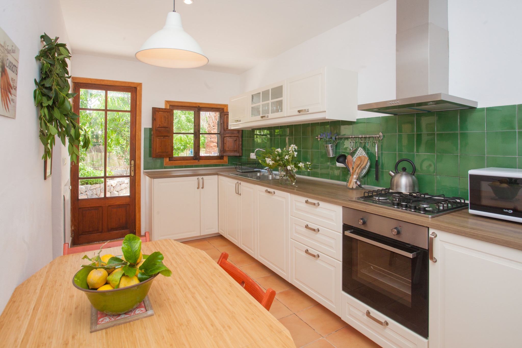 During the summer, you can refresh yourself in the 5m x 3m chlorine pool with a depth of 1.2m. It is surrounded by an artificial lawn area and four loungers where to bask in the sun. Enjoy a barbecue on the terrace with friends and family! The plot is fenced and there are neighbors around.
The rooms are distributed over two floors, including a nice sitting-dining area with satellite-TV and fireplace as well as kitchen with gas stove on the ground floor. Rustic furniture blends with modern equipment and we can still see the antique wooden beams. There's also a double bedroom with closet and a shower bath on the ground floor. A game room, two more bedrooms with a double bed, and a shower bath are on the first floor. One of these bedrooms comes with a wardrobe and all have A/C (mind that one air conditioning unit is mobile). If necessary, we supply a cot and a high chair. Furthermore, there's a laundry with washer, iron and ironing board.
Sóller is a charming village located in the Sierra de Tramuntana. In Sóller you can take the historical train and go to Palma de Mallorca - a wonderful journey passing green valleys, mountains and picturesque villages. Hiking enthusiasts find beautiful paths nearby, eg from Biniaraix to Cúber. The area is also ideal for cycling. The island capital, Palma de Mallorca, is offered for a cultural visit and stands out for La Seu Cathedral and Bellver Castle. In Sóller and Puerto de Sóller you will find supermarkets, restaurants and all needed amenities for an independent stay. The next sand beach is in Puerto de Sóller. Note: This accommodation is intended for families and guests over 28 years old who are looking for a peaceful stay. Bookings for parties or celebrations are not accepted. A copy of the identification document of all guests will be required to confirm the reservation. Consult the advertiser for possible charges. Pets are not allowed. The holding of events is forbidden.
Distances
Beach: 3.9 km - Port de Soller
Airport: 32.8 km - Aeroport de Son Sant Joan
Golf course: 15.6 km - Golf Son Termes
Town: 4.7 km - Sóller
Train station: 1.7 km - Estació de Sóller
Bus stop: 3.5 km - Carrer de Cetre, Sóller
Ferry: 31.9 km - Port de Palma
Hospital: 27 km - Son Llàtzer
Tourist license: ETV/6017Single Rental Registry: ESFCTU00000702800010647100000000000000000000ETV/60170The Ecotasa (tourist tax) must be paid cash on site when checking in. The amount varies between 0.55€/night and guest during the low season and 2.2€/night and guest during the high season. The tax is reduced by half from the 9th day of your stay. All guests have to pay the Ecotasa, except people under 16 years. Homerti - Central de Reservas CR/33 Electricity (January - December): 0.30 EUR/KW (mandatory) <br> <br />