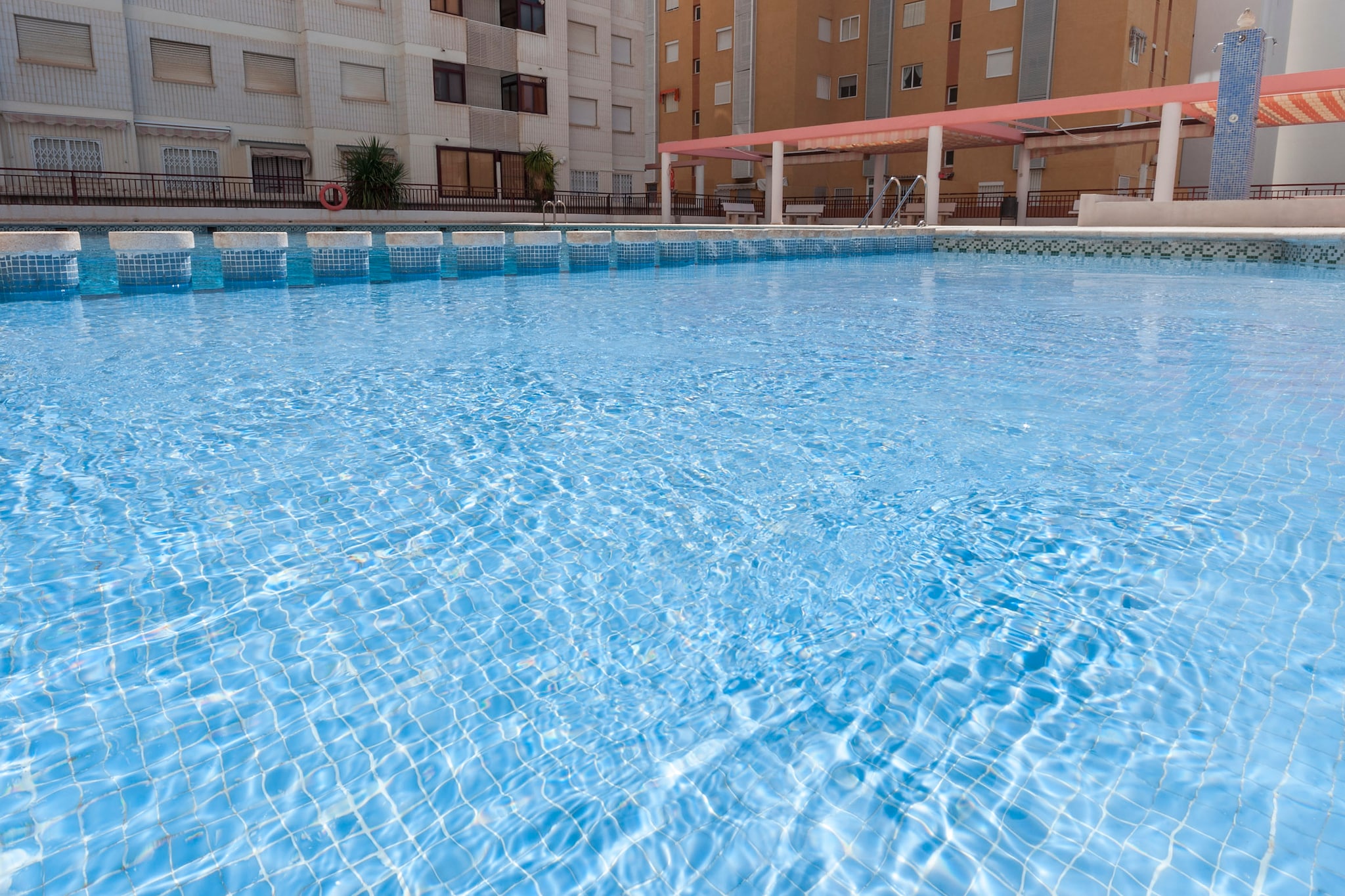There's a shared, 15m x 10m chlorine pool with a depth ranging from 1.5m to 2.2m and a childrens' pool (depth: 0.6m). If you're reluctant to give up your daily sports routine while you're on holidays, you can use the shared tennis court (please bring your own equipment). The apartment is on the fourth floor with lift and counts with a 6m2 sized terrace overlooking the street and the urbanization.
The nice apartment features a sitting-dining room with TV (local channels), a kitchen with vitro hob and a few cooking utensils, a washing machine, iron and ironing board and a bath with bath tub. You can choose between three bedrooms, two with two single beds and one double bedroom with en-suite bath with bath tub. A cot and a high chair are available upon request. Two electric radiators and three fans complete the equipment.
Its located only a minute walk from the thin sand beach, Playa de GandÃa, where you can rent hammocks and parasols, play beach volley, practice waterports or have a nice walk at the seaside and port, wich is full of bars, restaurants and ice creams shops. So, the beach offers a wide range of activities for all tastes, depending of what you fancy to do, since resting in the sun to be more active and practice sports.
You can also visit GandÃa"s old town, wich not only has excelent restaurants, but a nice historycal story to tell. You can discover more about the past of this city, and visit important and beautiful monuments, like Ducal palace, the nice City Council or Santa Clara"s convent.
The pool is open from Easter Week to end of September, from 09h to 15h and from 17h to 22h. Note: This accommodation is intended for families and guests over 27 years old who are looking for a peaceful stay. Bookings for parties or celebrations are not accepted. A copy of the identification document of all guests will be required to confirm the reservation. Consult the advertiser for possible charges. Please note that the keys to access the property will be in a mailbox at a nearby petrol station. You will receive the coordinates of the petrol station and the details of the mailbox three days prior to your arrival. Pets are not allowed. The holding of events is forbidden. Please note that the opening and closing dates of the communal pool are subject to community regulations and may vary depending on the season, without prior notice. Updated information will be available upon your arrival.
Distances
Beach: 0.35 km - Playa de Gandia
Airport: 75 km - Valencia
Golf course: 17 km - Oliva Nova Golf
Town: 0.01 km - Playa de Gandia
Train station: 2 km - Grau de Gandia
Bus stop: 0.07 km - Playa de GandÃa
Ferry: 45 km - Dénia
Hospital: 7 km - GandÃa
Tourist license: CV-VUT0040569-V