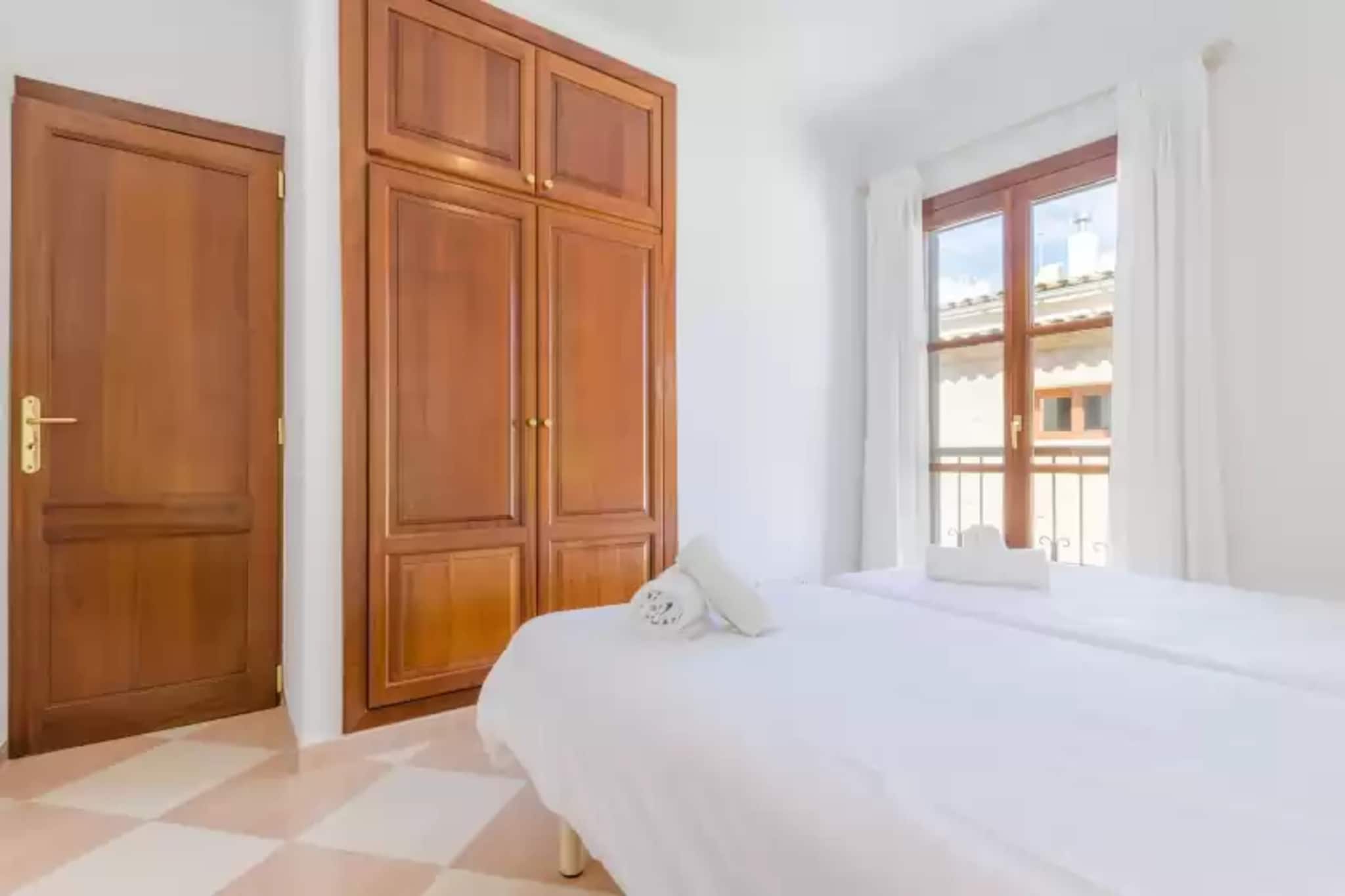 Living room, Kitchen(coffee machine, microwave), bedroom(double bed), bedroom(single bed, single bed), bedroom(single bed), bathroom, bathroom, cooker, oven, dishwasher, fridge-freezer, bath tub, shower, washbasin, washbasin, toilet, toilet, bidet, balcony or terrace, balcony or terrace, children\'s bed, high chair