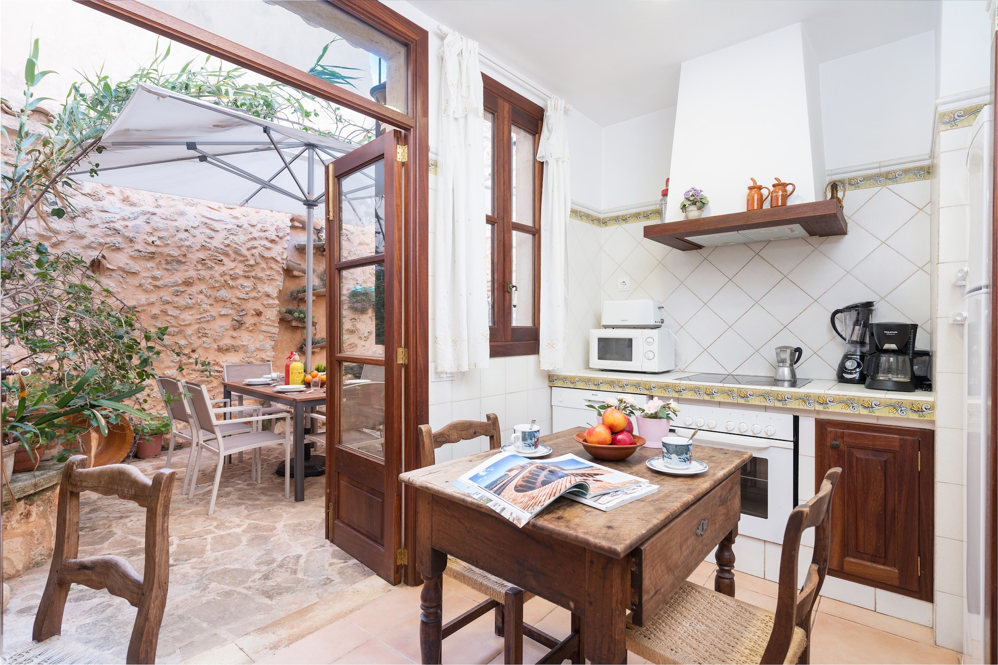 Living room, Living room, dining room, Kitchen(coffee machine, oven), bedroom(2x single bed), bedroom(double bed), bedroom(double bed), bathroom, bathroom, cooker, microwave, dishwasher, fridge-freezer, bath tub, shower, shower, washbasin, washbasin, toilet, toilet, air conditioning, air conditioning, air conditioning, garden, garden furniture, BBQ, children\'s bed, high chair