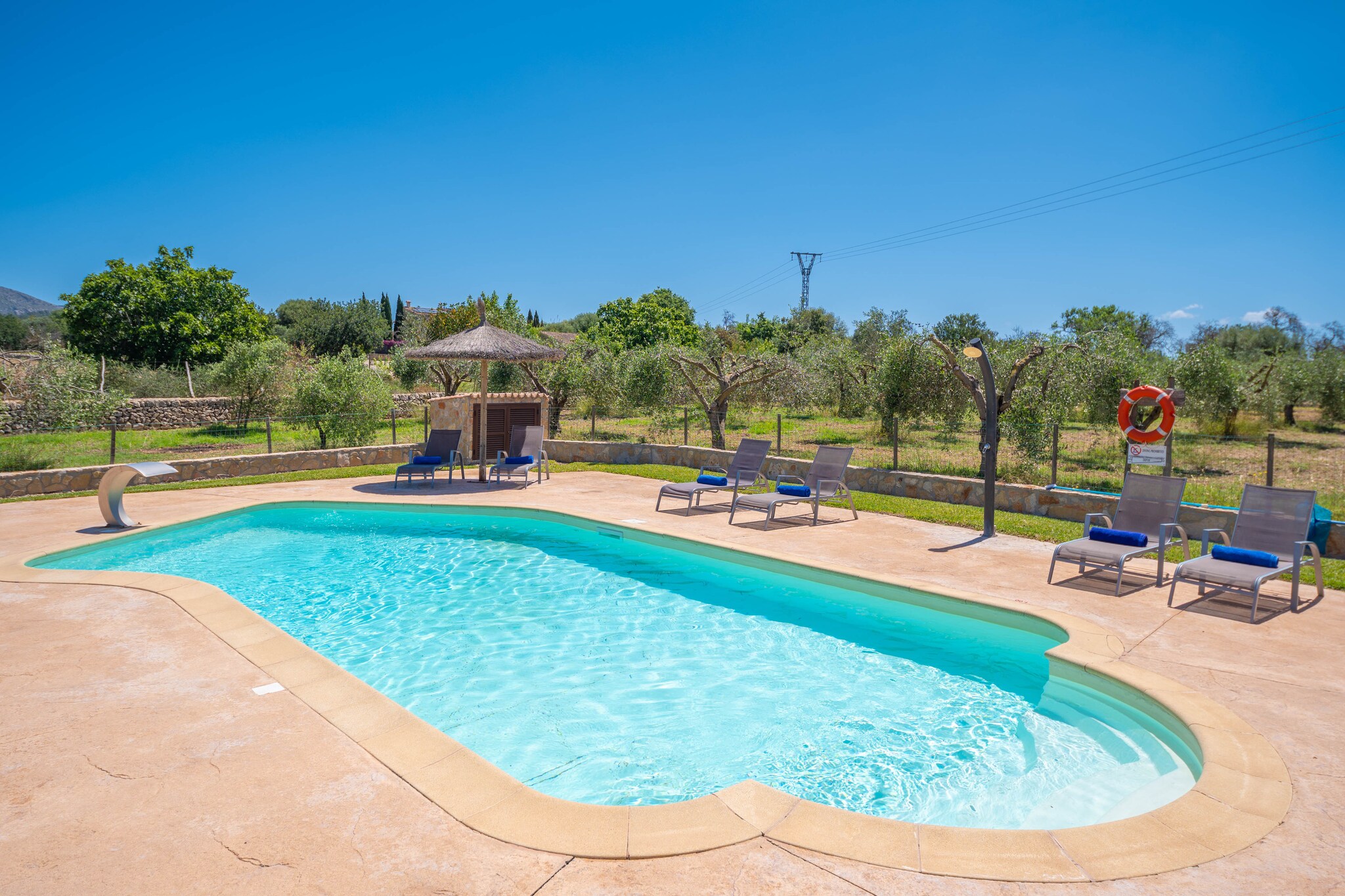 This wonderful villa offers spectacular exteriors. The green garden, the countryside and the mountains surround the house and a beautiful private salt swimming pool. The pool measures 9.4 x 4.2m and has a depth of 1 to 1.7m. Around the pool there are 8 sun loungers for sunbathing, an outdoor breakfast area and a porch to enjoy a barbecue. In addition, the main porch invites you to relax on the outdoor sofa or to dine in the evening. For the little ones, there is a playground in the garden for them to enjoy playing outdoors.
The house has two levels, the ground floor and the -1 floor. On the main floor there is a spacious living room, with TV-SAT, opened to the dining kitchen, equipped with a gas cooktop. On each floor there are two bedrooms, one with twin beds and the other with a double bed. All bedrooms have a closet. There is a cot and a high chair. There are two bathrooms, one with a shower on the main floor and the other with a bathtub on the -1 floor. There is air conditioning in all rooms of the house. The laundry room offers a washing machine, an iron and an ironing board.
The property is located on the outskirts of Alcúdia, just 1.1 km from the town centre. In Alcúdia you will find services such as bars, restaurants, supermarkets, etc. The nearest beach is Puerto de Alcúdia, just 2.3 km away. Alcanada Golf Course is 5.5 km away.
AC and central heating are for free from 12:00 am to 3:00 pm and from 7:00 pm to 5:00 am. If you wish to use it 24 hours a day, you have to pay an extra fee.
The hours of the exterior lights are from 9:30 p.m. to 12:30 a.m. The pool cascade hours are from 11:30 a.m. to 1:00 p.m. and from 4:00 p.m. to 5:30 p.m. Note: This accommodation is intended for families and guests over 26 years old who are looking for a peaceful stay. Bookings for parties or celebrations are not accepted. A copy of the identification document of all guests will be required to confirm the reservation. Consult the advertiser for possible charges. Pets are not allowed. The holding of events is forbidden. There is exterior parking for 5 cars.
Distances
Beach: 2.3 km - Puerto de Alcúdia
Airport: 60.8 km - Son Sant Joan
Golf course: 5.5 km - Golf Alcanada
Town: 1.1 km - Alcúdia
Train station: 16.5 km - Sa Pobla
Bus stop: 1.6 km - AV. La Marina, Alcúdia
Ferry: 2.8 km - Puerto de Alcúdia
Hospital: 25.2 km - Hospital Comarcal de Inca
Guests are kindly required to dispose of all rubbish and ensure the property is properly tidied before departure. Should this not be the case, a charge of €90 will be deducted from the security deposit. Tourist license: VT/1960Single Rental Registry: ESFCTU000007043000006507000000000000000000000VT/19601There's a mandatory tourist tax in Balearic Islands, called Ecotasa. All guests, except people under 16 years, have to pay this tax. The amount varies between 0.55€/night and guest during the low season and 2.2€/night and guest during the high season .The tax is reduced by half from the 9th day for your stay. Homerti - Central de Reservas CR/33 Air Conditioning (November - December): 20 EUR/Night (optional) <br> <br /> Heating (January - December): 20 EUR/Night (optional) <br> <br />