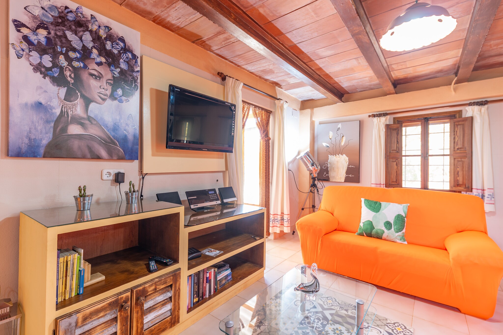 The private chlorine swimming pool, measuring 7x5 metres and with a depth of between 1.50x1.70 metres, stands out in the extensive natural surroundings, ideal for sunbathing on the sun loungers next to the pool. If you prefer to relax in the shade, a furnished porch, located next to the barbecue ready to prepare delicious grills, will give you that option. The house offers an expanse of nature ideal for the little ones to play in while enjoying a dip in the pool. 

Entering the rustic interior of the house distributed over 3 floors, it offers a spacious living room with two sofas ideal for enjoying a movie night with all the guests thanks to the Smart TV. The gas cooker is fully equipped with all the necessary utensils to cook comfortably during your stay. The kitchen space also has a dining table with 4 chairs to enjoy delicious meals with all the guests. To complete this ground floor, there is a complete bathroom equipped with a shower. Going up to the first floor, you will find the 2 bedrooms of the house, one with a double bed and the other with two single beds. To serve this floor, there is a second bathroom which is divided into two floors: downstairs you will find the washbasin and the toilet, and going upstairs, you will find the bathtub. Finally, the house has a washing machine, iron and a cot and high chair if you are travelling with a baby.

Known for its tranquil atmosphere and rural setting, Campos offers an authentic experience of Mallorcan life. The village is famous for its traditional architecture, with stone houses and narrow streets that invite you to stroll around and discover picturesque corners. Here you will find a variety of bars and restaurants where you can sample the local gastronomy. If you prefer the coast, 10km away, you can enjoy the long beach of Es Trenc, popular for its fine white sand and crystal clear water. A change of towels and sheets during the stay is included.  Consult the advertiser for possible charges. Pets are not allowed. The holding of events is forbidden. There is exterior parking for 2 cars.  
Distances
Beach: 10.7 km - Es Trenc
Airport: 36.4 km - Palma de Mallorca
Golf course: 26.1 km - Golf Son Antem
Town: 7.2 km - Campos
Train station: 31.4 km - Manacor
Bus stop: 6.3 km - Campos
Ferry: 48.2 km - Palma de Mallorca
Hospital: 6.4 km - Centre de Salut Xaloc Campos
Tourist license: ETV/5186Single Rental Registry: ESFCTU00000700800038425300000000000000000000ETV/51868There's a mandatory tourist tax in Balearic Islands, called Ecotasa. All guests, except people under 16 years, have to pay this tax. The amount varies between 0.55â‚¬/night and guest during the low season and 2.2â‚¬/night and guest during  the high season .The tax is reduced by half from the 9th day for your stay.