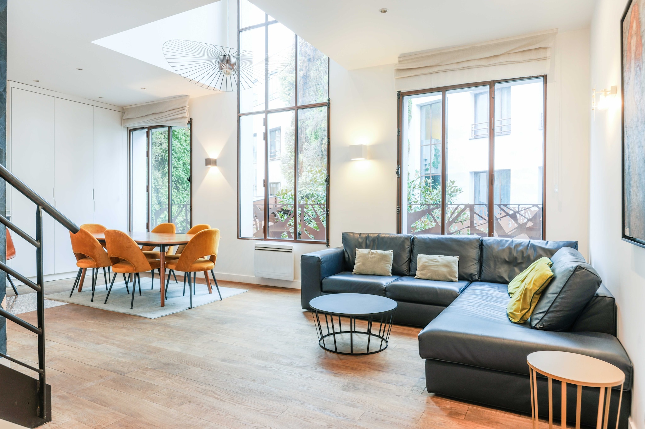 Welcome to Le Patio des Artistes, a stunning duplex loft with 6 meters of glass walls situated in a private property. This newly constructed loft feat

The apartment's location means you'll be able to get around the French capital quickly and easily, thanks to the many public transport options available:

Metro: Ledru/Rollin (line 8), a 3-minute walk away
Metro: Bastille (line 5), a 3-minute walk away
Metro: Bréguet Sabin (line 5), an 8-minute walk away
Numerous day and night BUS lines
Vélib station
Several cab companies available: Taxis G7 (the most popular): call 36 07.