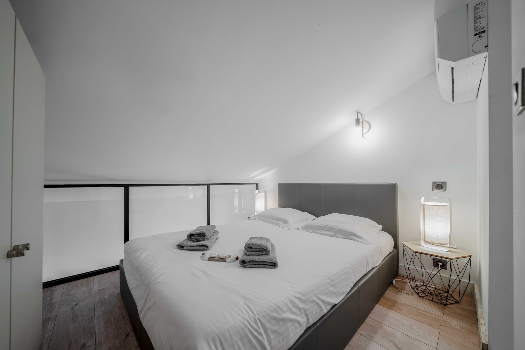 On the 4th floor: (Living room(TV, seating area), Kitchen(dining table, electric kettle, toaster, hood, coffee machine, fridge, freezer, electric hot plates, Coffee, Wine glasses), bedroom(double bed), bedroom(double bed), bathroom(shower, toilet), bathroom(shower, toilet))\n\nBed Linen, Hot Water, Wardrobe, First Aid, Play area, tumble dryer, cot, heating, iron, hairdryer, Towels/Sheets (Incl.), body soap, Essentials, Cleaning Disinfection, Downtown, Enhanced cleaning practices, High touch surfaces disinfected, Long term stays allowed, Near Ocean, Town