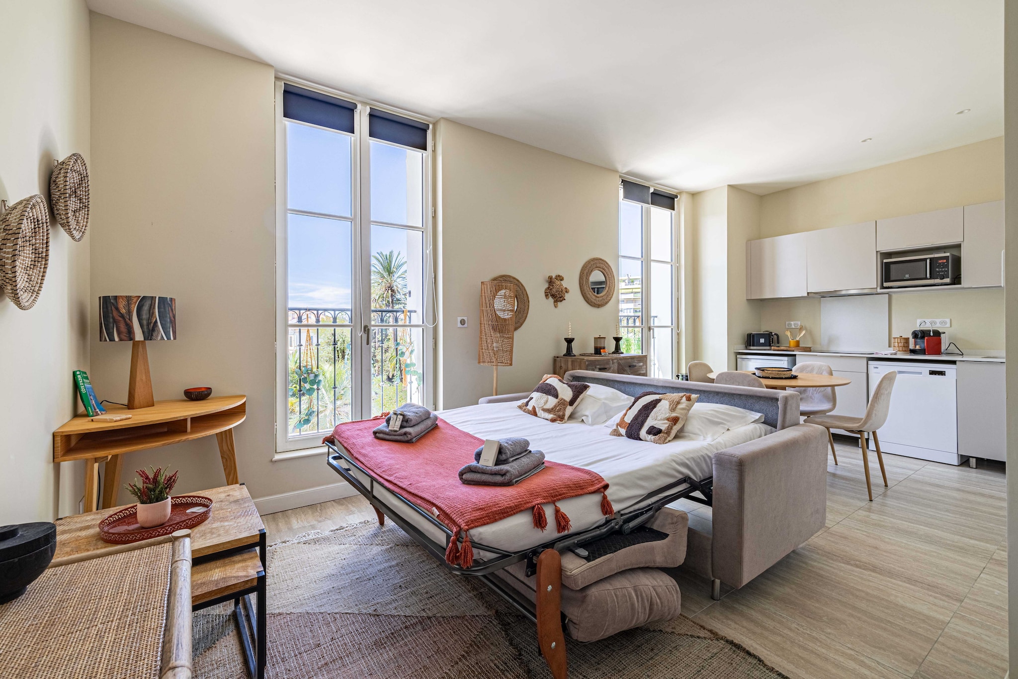 On the 2nd floor: (Kitchen(stove, electric kettle, toaster, coffee machine, oven, microwave, dishwasher, fridge, dishes and cutlery), Living/bed room(Bed Linen, Desk, Internet Access DSL, Wardrobe, double sofa bed, TV, air conditioning), bathroom(shower, washbasin, toilet, Towels/Sheets (Incl.), shampoo))\n\nElevator, Hot Water, First Aid, Play area, tumble dryer, cot, washing machine, heating, iron, hairdryer, Essentials, Carbon monoxide detector, Cleaning Disinfection, Downtown, Enhanced cleaning practices, High touch surfaces disinfected, Long term stays allowed, Near Ocean, Town