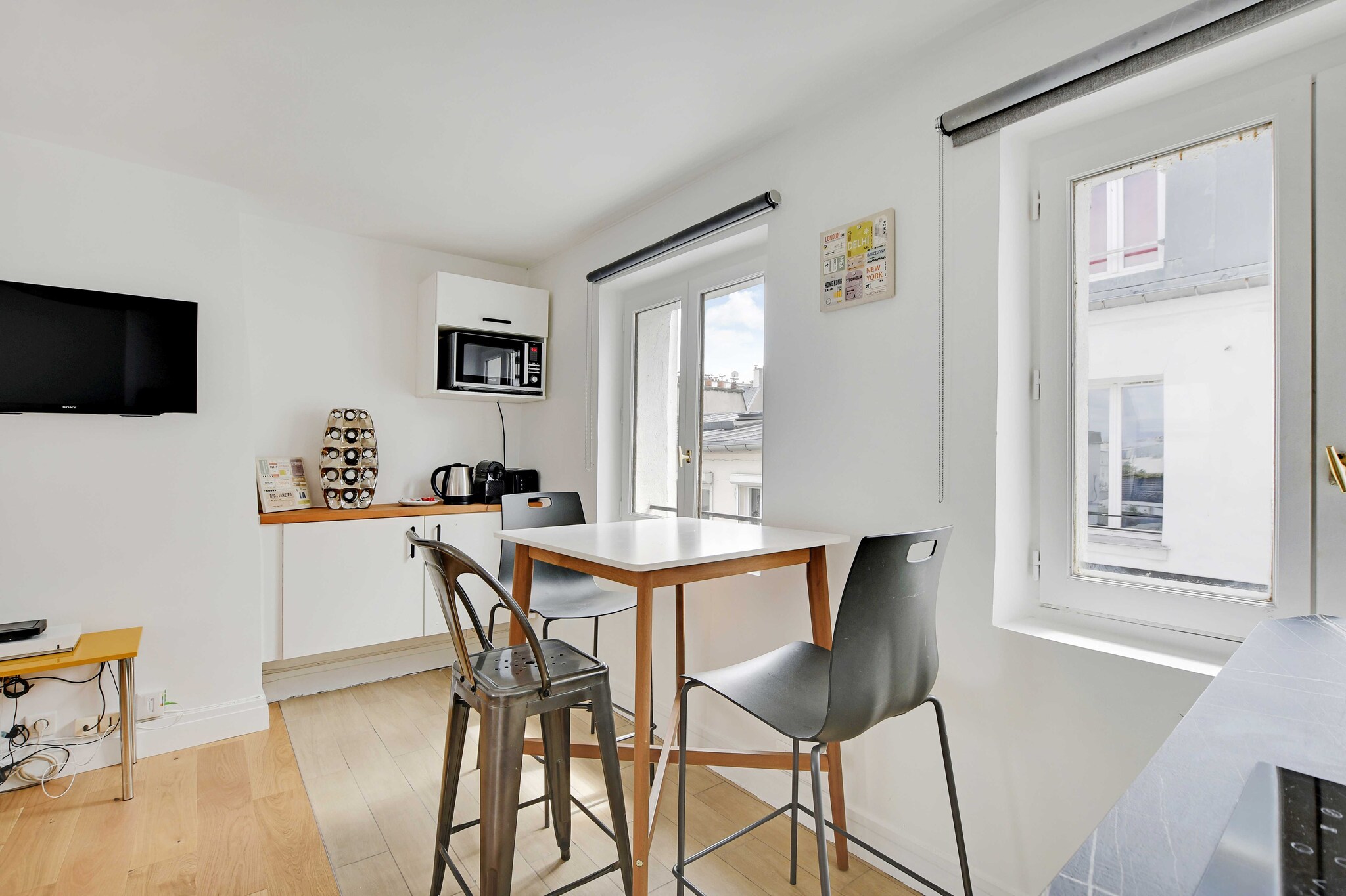 On the 4th floor: (Kitchen(stove, electric kettle, toaster, coffee machine, microwave, fridge, heating), Living/bed room(Bed Linen, Wardrobe, TV, Queen Bed), bathroom(shower, toilet, hairdryer, shampoo, hot water))\n\nHot Water, Internet Access DSL, First Aid, Play area, heating, iron, Dedicated workspace, Carbon monoxide detector, Cleaning Disinfection, Downtown, Enhanced cleaning practices, High touch surfaces disinfected, Long term stays allowed, Town