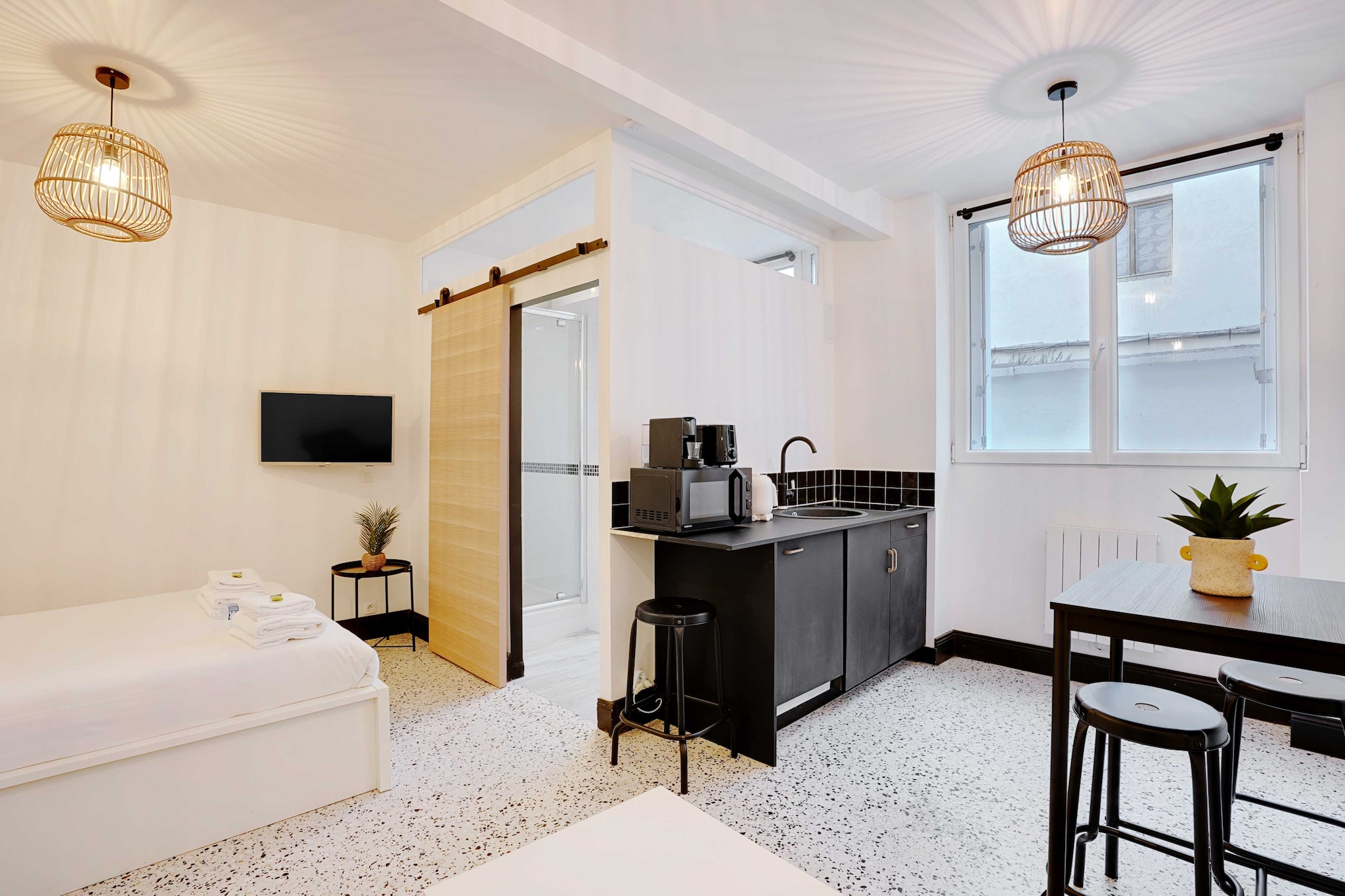 Ground floor: (Kitchen(stove, electric kettle, toaster, coffee machine, microwave, fridge, dishes and cutlery, Cooking basics), Living/bed room(Bed Linen, Desk, Wardrobe, double bed, double sofa bed, TV), bathroom(hairdryer, Towels/Sheets (Incl.), shampoo, Essentials))\n\nHot Water, Internet Access DSL, First Aid, Play area, heating, iron, Carbon monoxide detector, Cleaning Disinfection, Downtown, Enhanced cleaning practices, High touch surfaces disinfected, Long term stays allowed, Room-darkening shades, Town