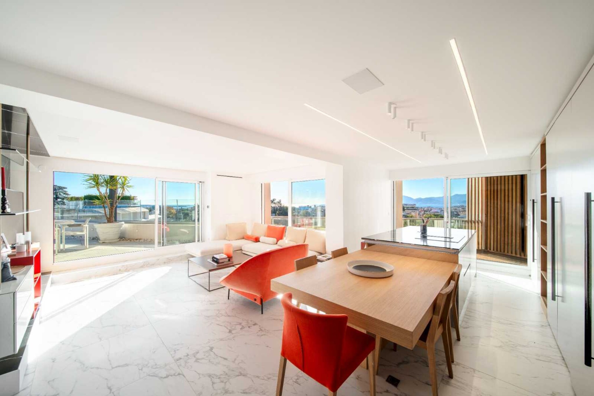 On the 5th floor: (Living room(TV, dining table, seating area), Kitchen(hob, electric kettle, toaster, coffee machine, oven, microwave, dishwasher, fridge, freezer), Bedroom with bathroom(double bed, shower, washbasin, toilet), Bedroom with bathroom(double bed, shower, washbasin, toilet), Bedroom with bathroom(double bed, shower, washbasin, toilet), Bedroom with bathroom(double bed, shower, washbasin, toilet), Bedroom with bathroom(double bed, shower, washbasin, toilet))\n\nBed Linen, Desk, Elevator, Hot Water, Internet Access DSL, Wardrobe, First Aid, Beach, Play area, bath tub, cot, washing machine, balcony or terrace, heating, air conditioning, swimming pool, private outdoor pool, iron, hairdryer, Towels/Sheets (Incl.), shampoo, Essentials, Dedicated workspace, Carbon monoxide detector, Cleaning Disinfection, Downtown, Enhanced cleaning practices, High touch surfaces disinfected, Long term stays allowed, Near Ocean, Room-darkening shades, Sea view, Town