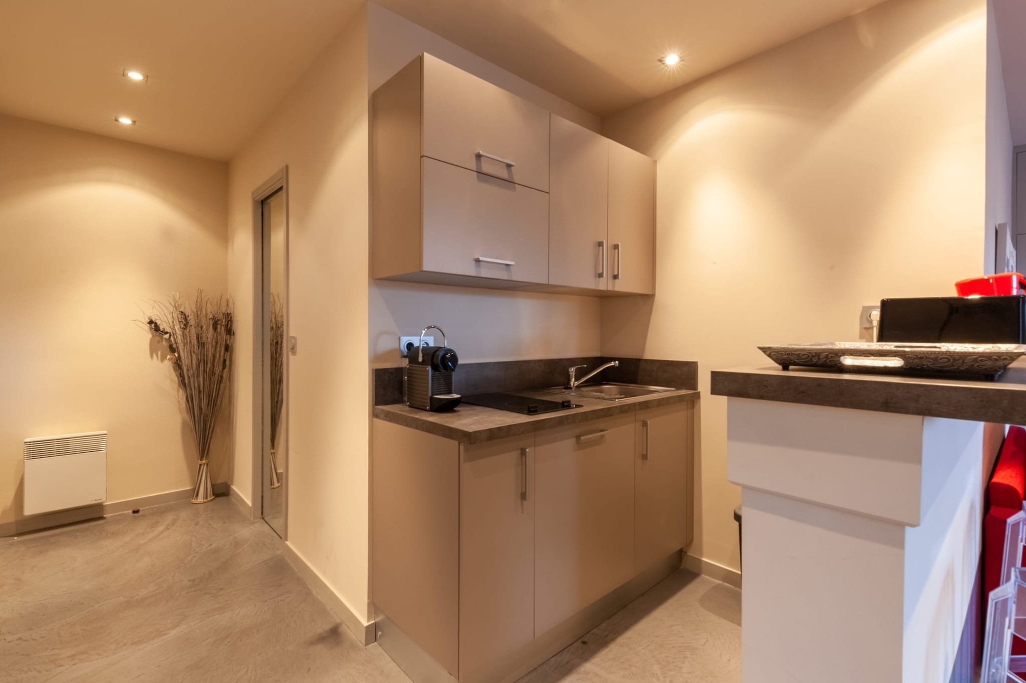 Ground floor: (Kitchen(stove, electric kettle, coffee machine, oven, microwave, fridge, dishes and cutlery), Living/bed room(Bed Linen, double bed, TV), bathroom(Towels/Sheets (Incl.), shampoo))\n\nHot Water, Internet Access DSL, Wardrobe, First Aid, Play area, balcony or terrace, heating, Essentials, Downtown, Enhanced cleaning practices, Long term stays allowed, Room-darkening shades, Town