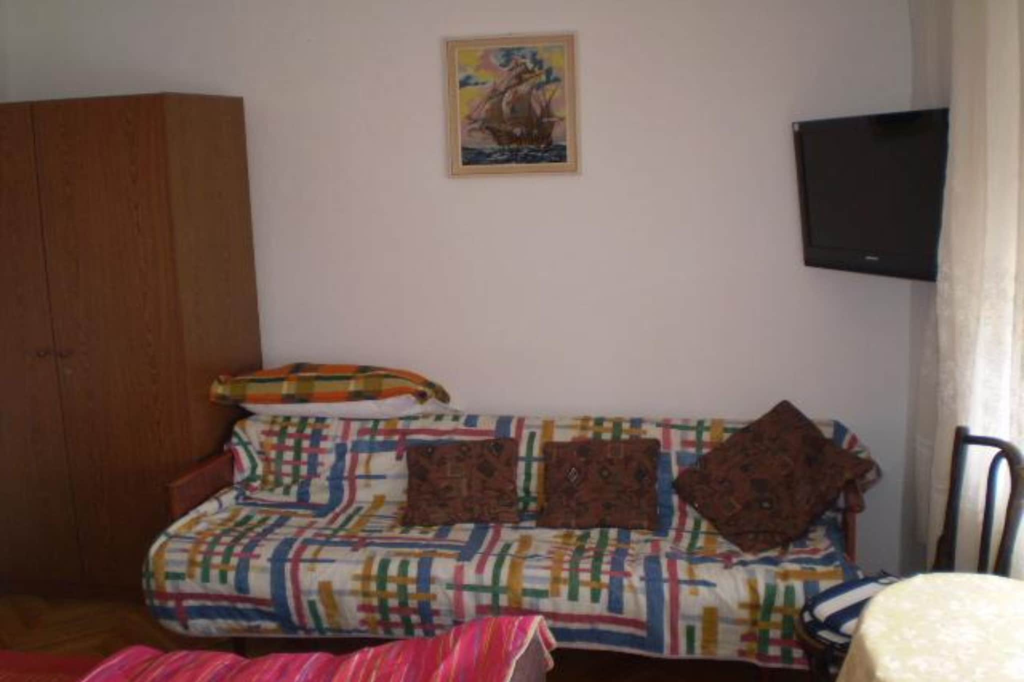 Apartments Tina - Double Room with Terrace and Sea view