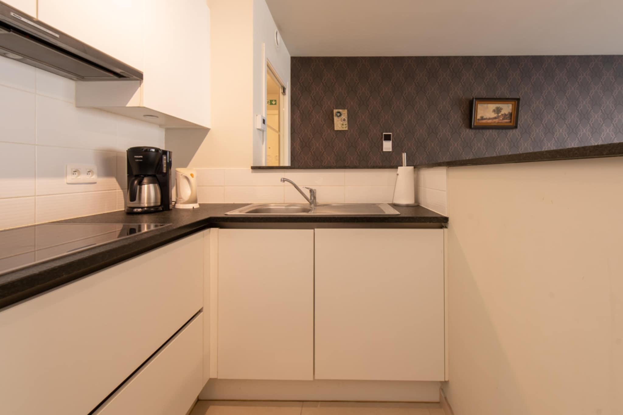 On the 1st floor: (open kitchen(hob(ceramic), electric kettle, toaster, coffee machine(cups, filter), combination microwave, dishwasher, fridge(+ freezer), Blender), Living/diningroom(TV(digital), dining table, seating area, balcony or terrace), bedroom(double bed(two single duvets), balcony or terrace), bedroom(double bed(two single duvets)), bedroom(bunk bed(duvet), balcony or terrace), bathroom(bathtub with shower, washbasin, washbasin, hairdryer), bathroom(shower, washbasin), toilet(toilet), Internet access)\n\ntumble dryer, washing machine, terrace(10 m2), terrace(10 m2), bicycle storage, parking, lift, ironing board, iron