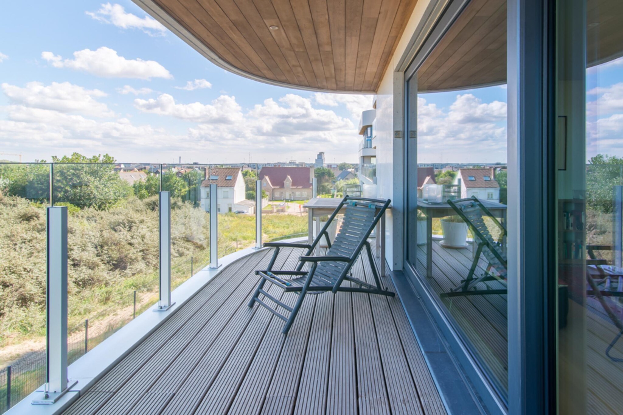 On the 1st floor: (open kitchen(hob(ceramic), electric kettle, toaster, coffee machine, combination microwave, dishwasher, Blender), Living/diningroom(TV(digital), dining table, seating area, fridge(+ freezer), balcony or terrace), bedroom(double bed(two single duvets), balcony or terrace), bedroom(bunk bed(duvet), bunk bed(duvet), balcony or terrace), bathroom(bath tub, shower, washbasin, washbasin), toilet(toilet), Internet access)\n\nterrace(10 m2), terrace(10 m2), bicycle storage, lift