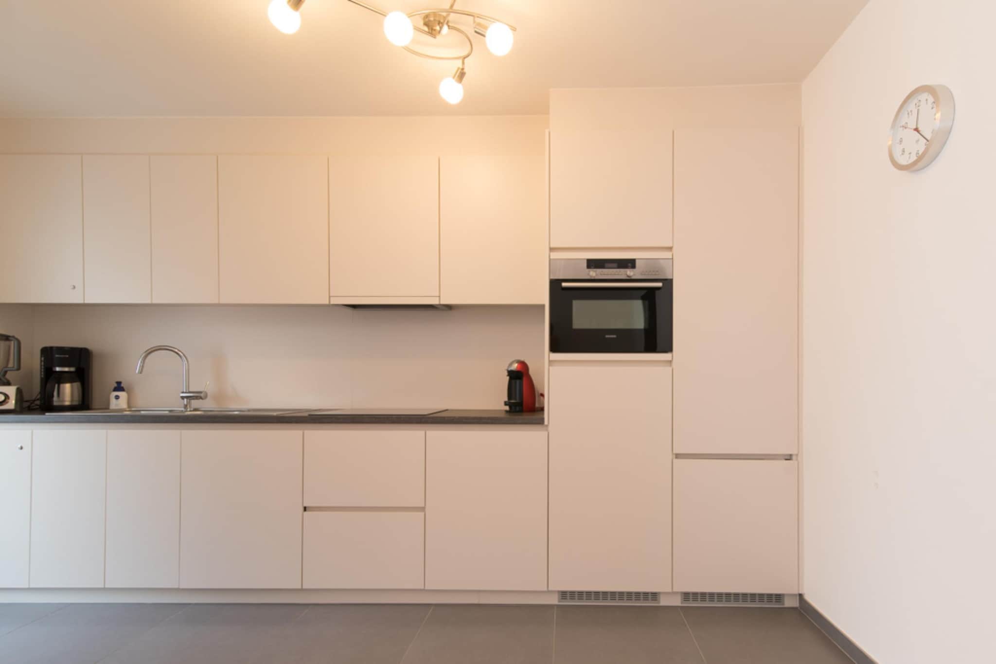 On the 3rd floor: (Living room(TV(digital), dining table, seating area), Kitchen(hob(ceramic), electric kettle, toaster, coffee machine(filter, pads), combination microwave, dishwasher, fridge-freezer, Blender), bedroom(double bed(two single duvets)), bedroom(double bed(two single duvets)), bedroom(double bed(two single duvets)), bathroom(shower(walk-in shower), washbasin, washbasin), toilet(toilet), Internet access)\n\ntumble dryer, washing machine, balcony, terrace(5 m2), bicycle storage, lift, ironing board, iron