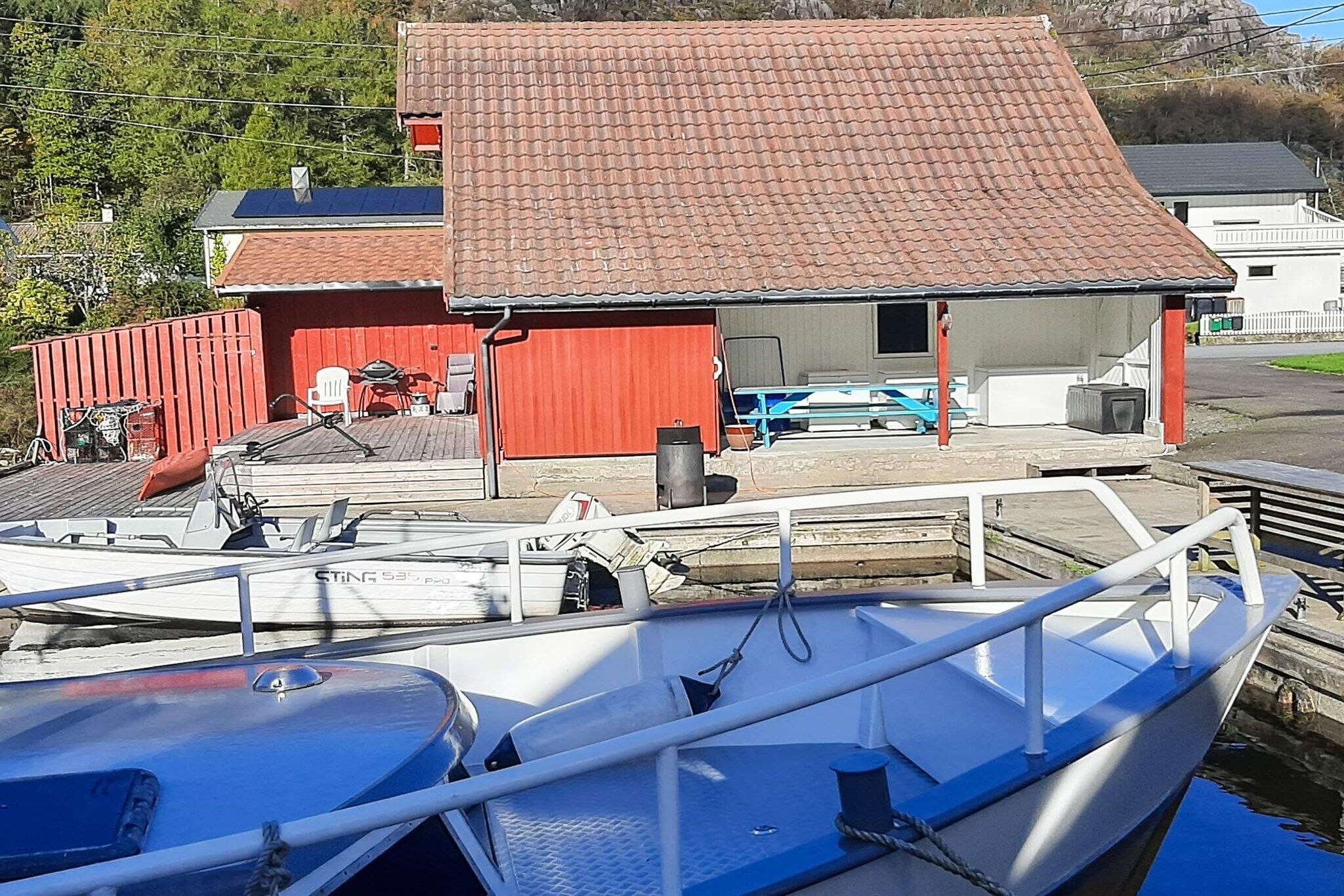 New fisherman’s cabin by the sea in Åna Sira, a small, idyllic community between Sokndal and Flekkefjord. Boat rental possible. The holiday house has two floors. On the ground floor there is a hallway, 1 bedroom, and an open kitchen/dining room as well as a bathroom/laundry room. The living room is on the first floor along with 2 additional bedrooms and a toilet room. All the bedrooms have one double bed. From the first floor, there is a great view over the sea. In Åna Sira, there are countless possibilities for activities and hikes within easy reach, e.g. Helleren with an old house under the mountains, or Jøssingham where the German warship Altmark was chased into the fjord during WW2 and British soldiers freed. The Science Museum in Jøssingham is definitely worth a visit. Great hiking opportunities to Brufjellhålene and Brufjell; please note that there can be challenges in getting there, so it is best in dry and calm weather. In the area, you can find as many as 28 different hiking trails, brochures are available in the cabin. We recommend a nice trip to "Roligheden", where you cross the bridge and turn right on the hill. There are several idyllic places there and also a small, cozy cafe called "Oldemors hage†(“great grandmothers garden"). Possible to rent an 18-foot boat with 50 HP and necessary equipment. The boat season runs from 1 May to 30 September. When gutting fish, please use the stone jetty. Guests can also borrow a kayak for free. Petrol for the boat as well as food can be bought at the grocery shop Joker, open 24 hours a day. There are great swimming opportunities and ziplines 300 meters from the holiday home, and a playground for children just 100 meters away. The holiday house is a great resort with countless opportunities for family activities, fishing, tours and recreation.